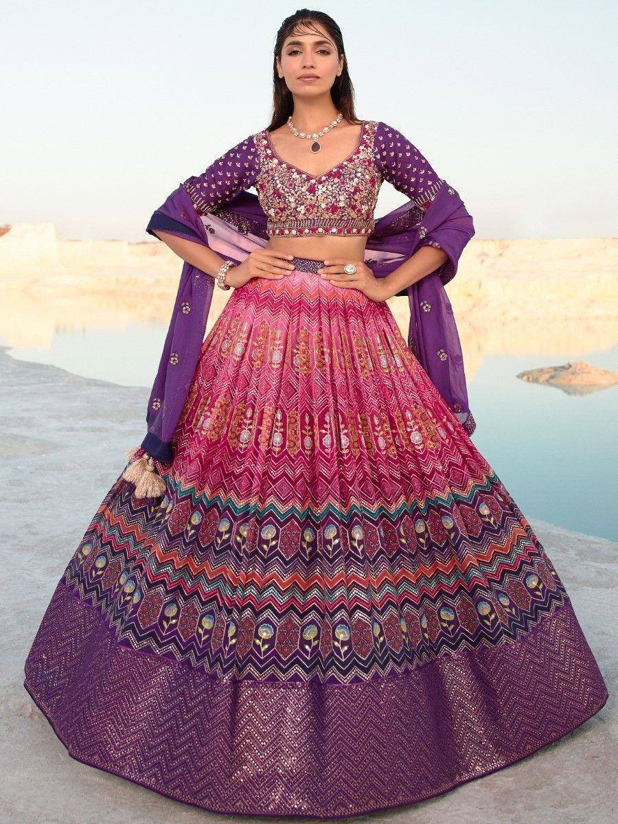 Purple and pink embroidered lehenga choli with dupatta, perfect for Indian ethnic occasions and weddings.