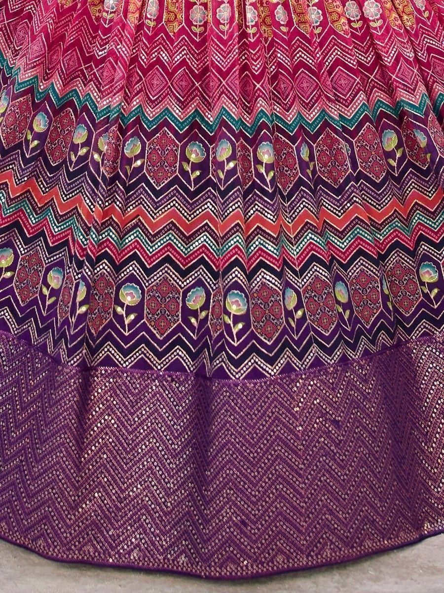 Vibrant purple and pink ethnic lehenga skirt with intricate floral and geometric patterns, perfect for Indian festive wear.