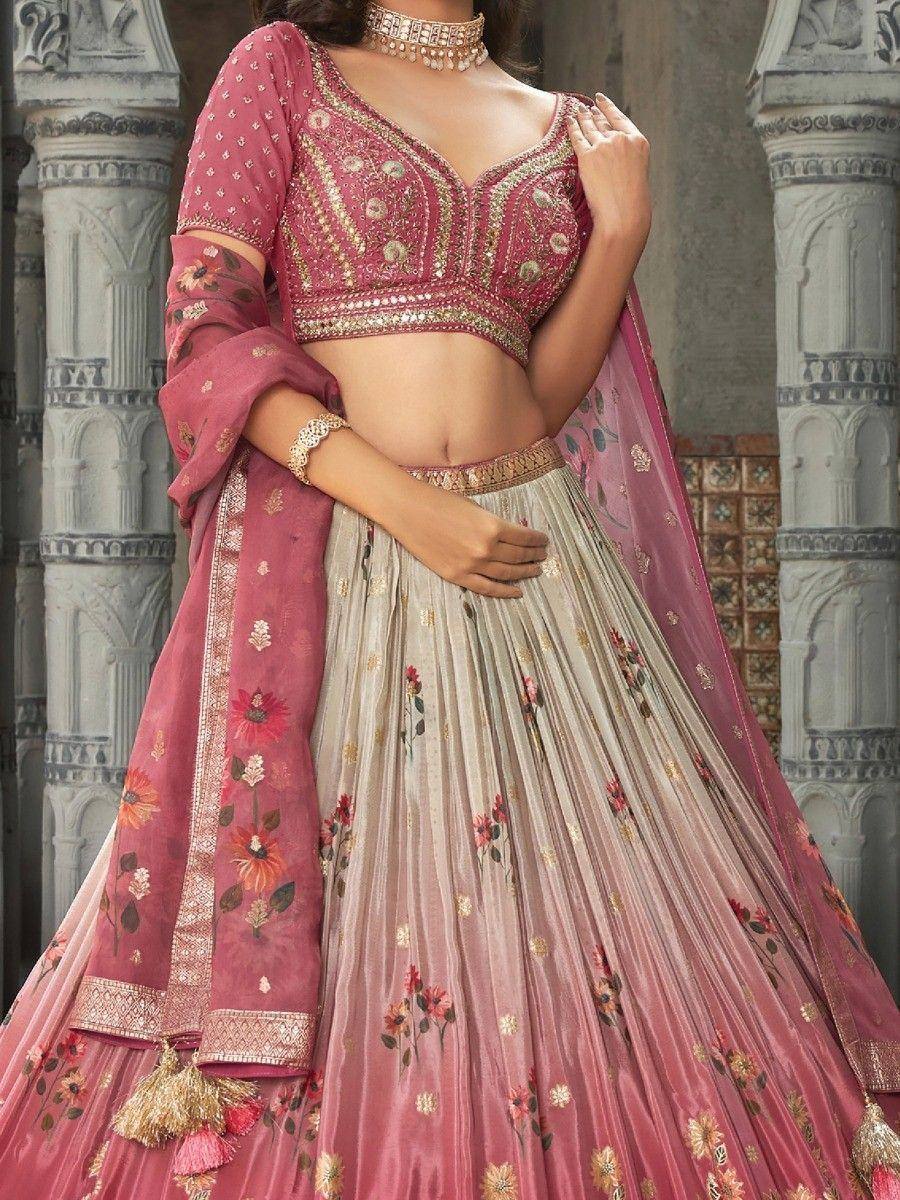 Pink and beige floral embroidered lehenga choli with dupatta, perfect for Indian weddings and festive occasions