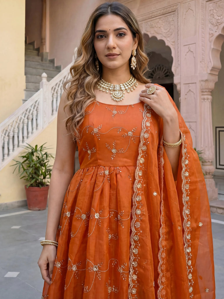 Stylish Orange Embroidered Silk Wedding Wear Gown With Dupatta