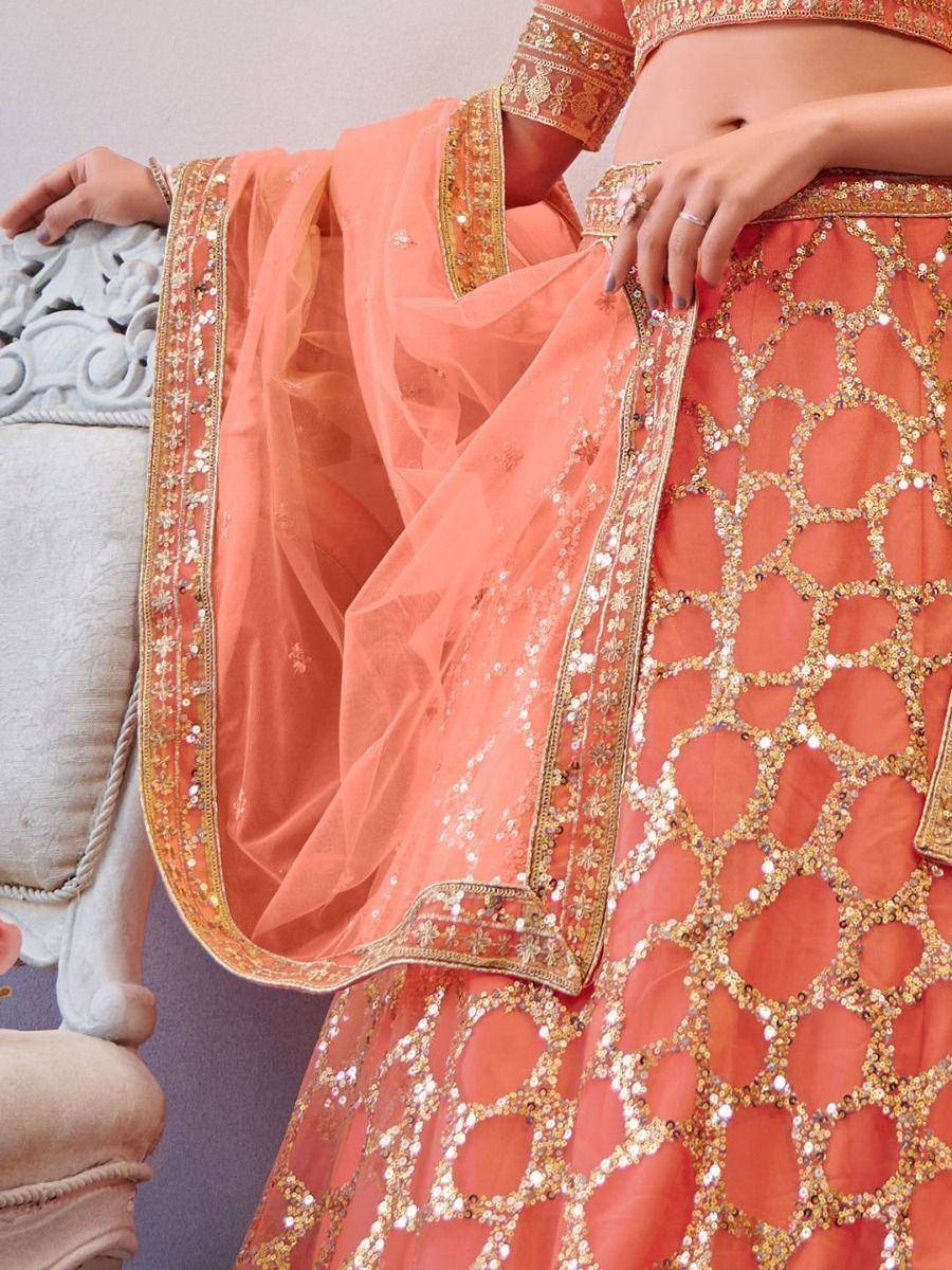 Peach lehenga choli with gold sequin embroidery and net dupatta, perfect for Indian ethnic occasions