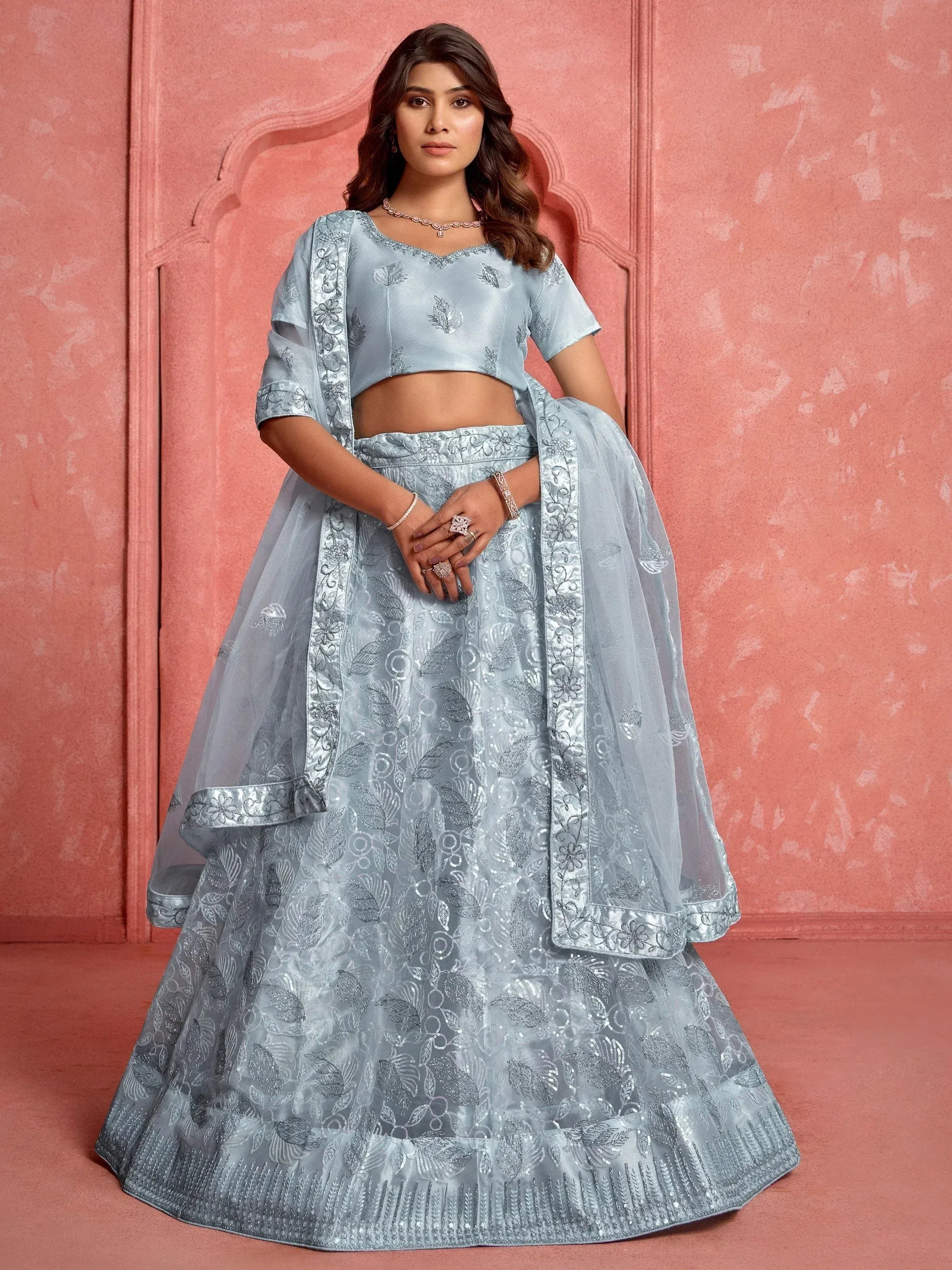 Light blue embroidered lehenga choli with floral motifs, perfect for Indian ethnic occasions