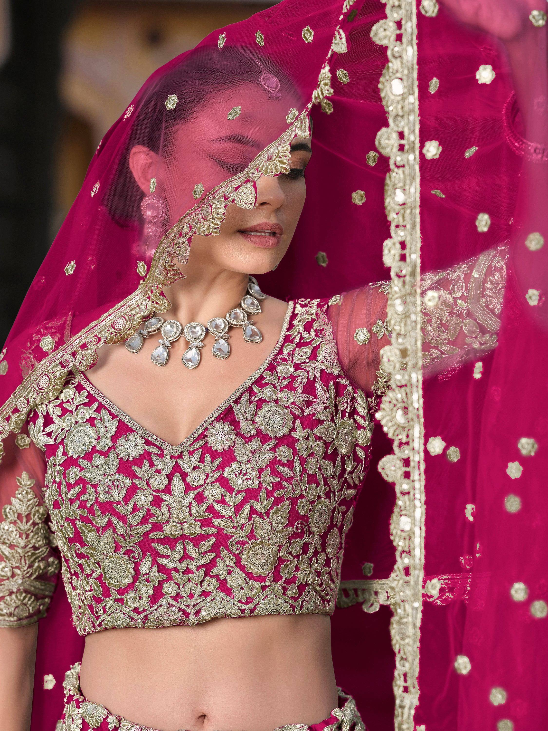 Fuchsia lehenga choli with gold floral embroidery and sheer dupatta, Indian ethnic wear