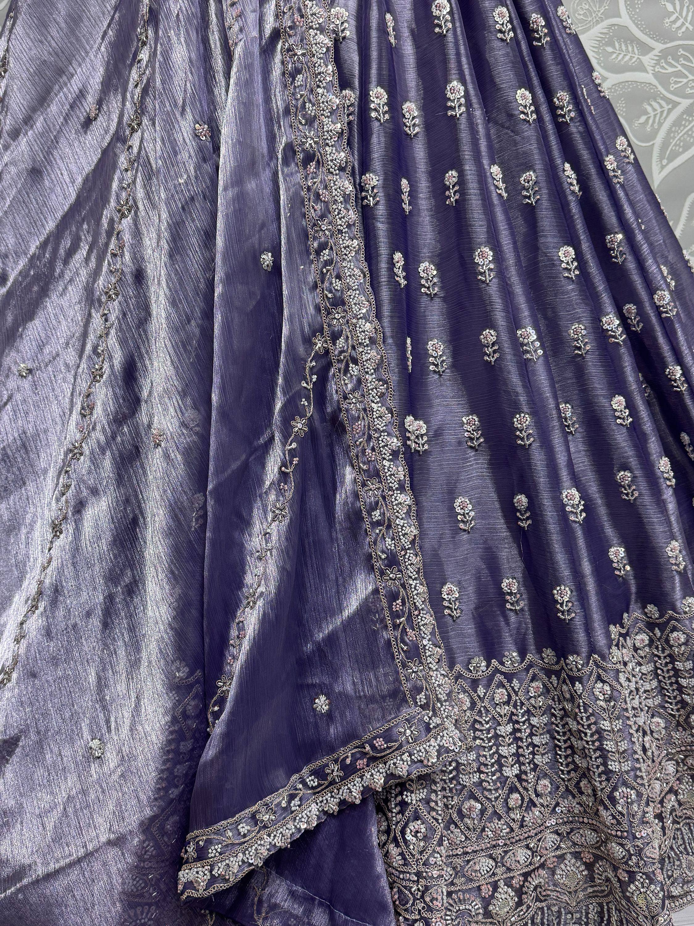 Purple designer lehenga with intricate floral beadwork and sequin embroidery for Indian ethnic wear