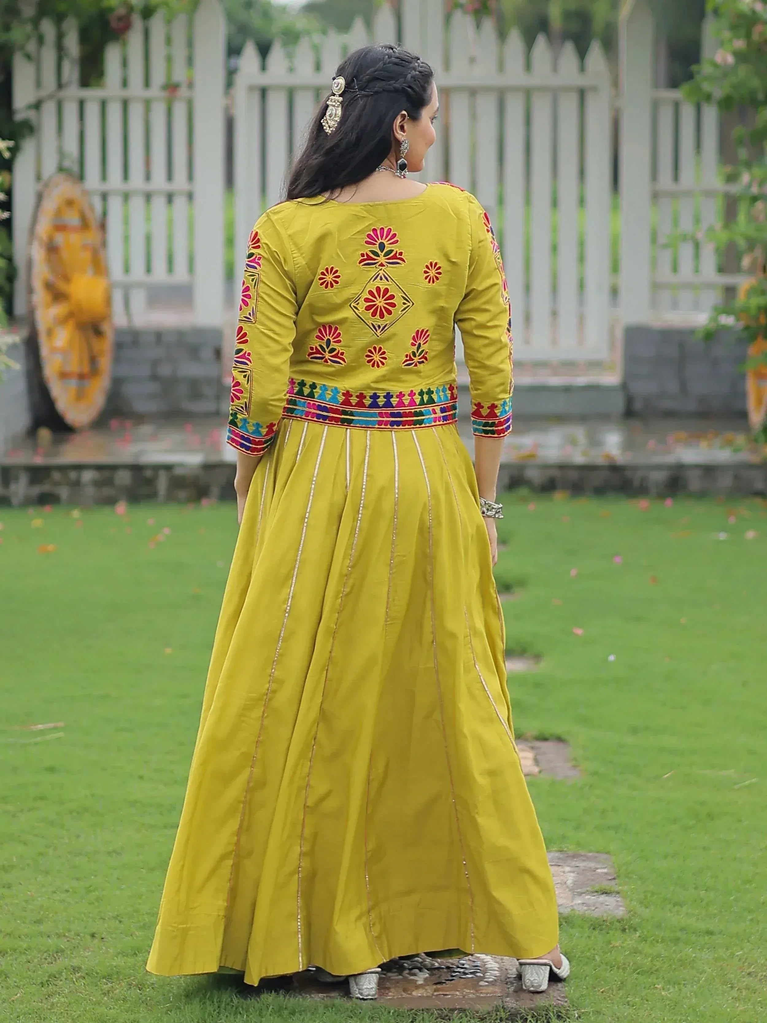 Yellow embroidered anarkali suit with floral motifs, perfect for Indian ethnic wear occasions