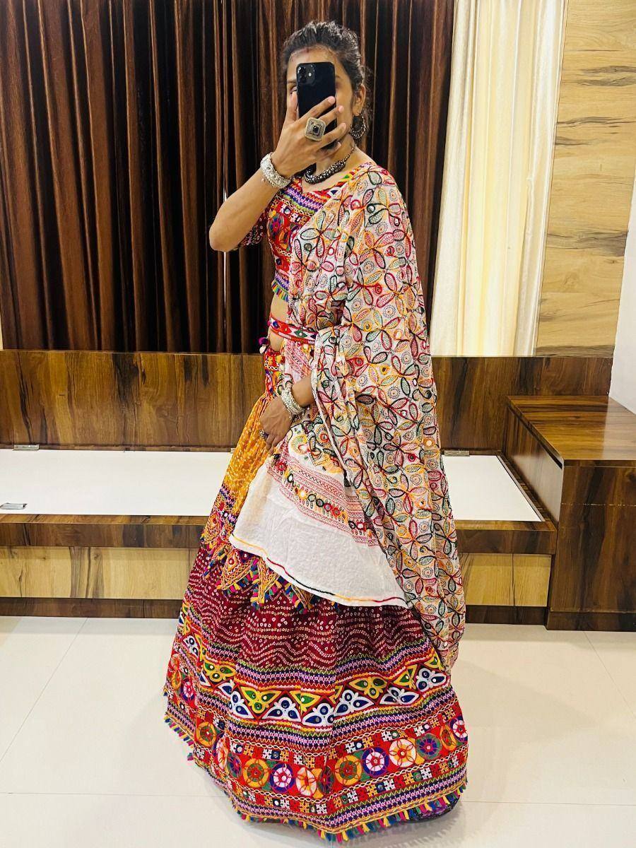 Colorful embroidered lehenga choli with mirror work, perfect for Indian ethnic wear and festive occasions.