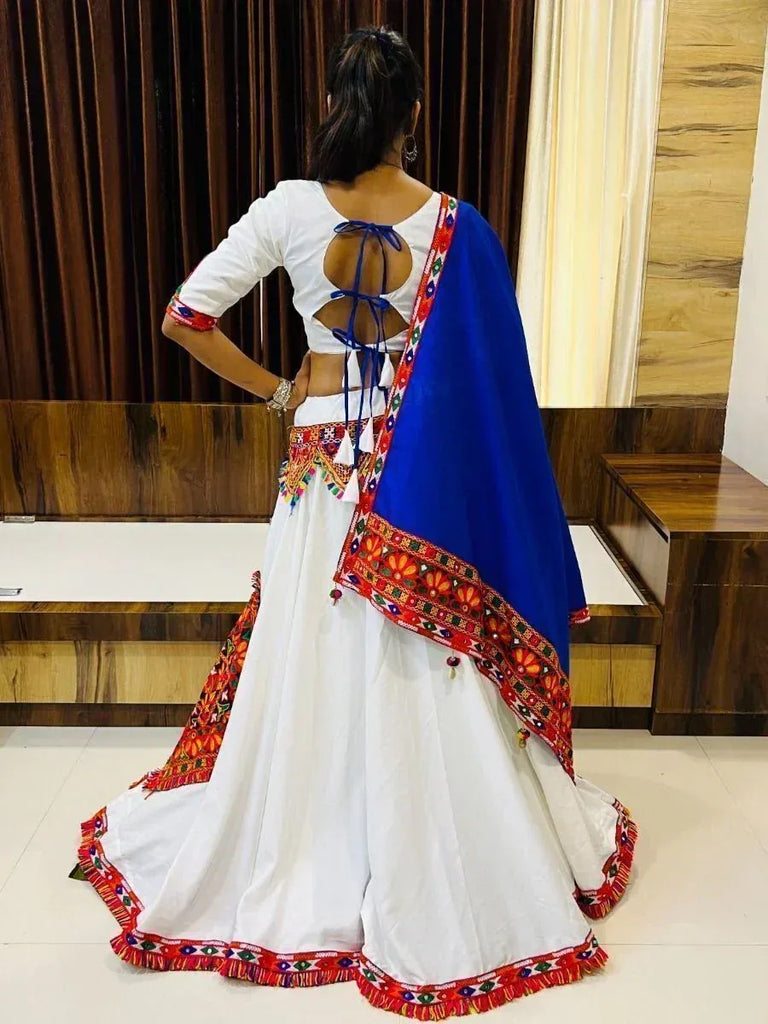 White embroidered lehenga choli with blue dupatta, back view, ethnic Indian wear