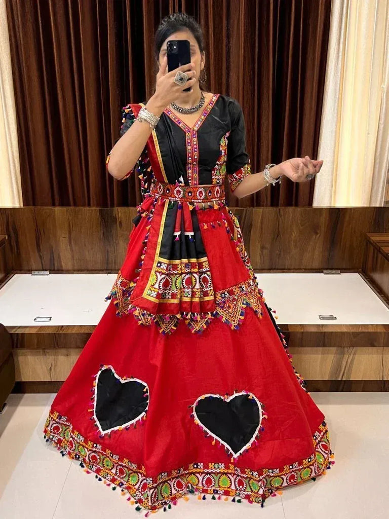 Red and black embroidered ethnic gown with heart motifs, perfect for Indian festive occasions