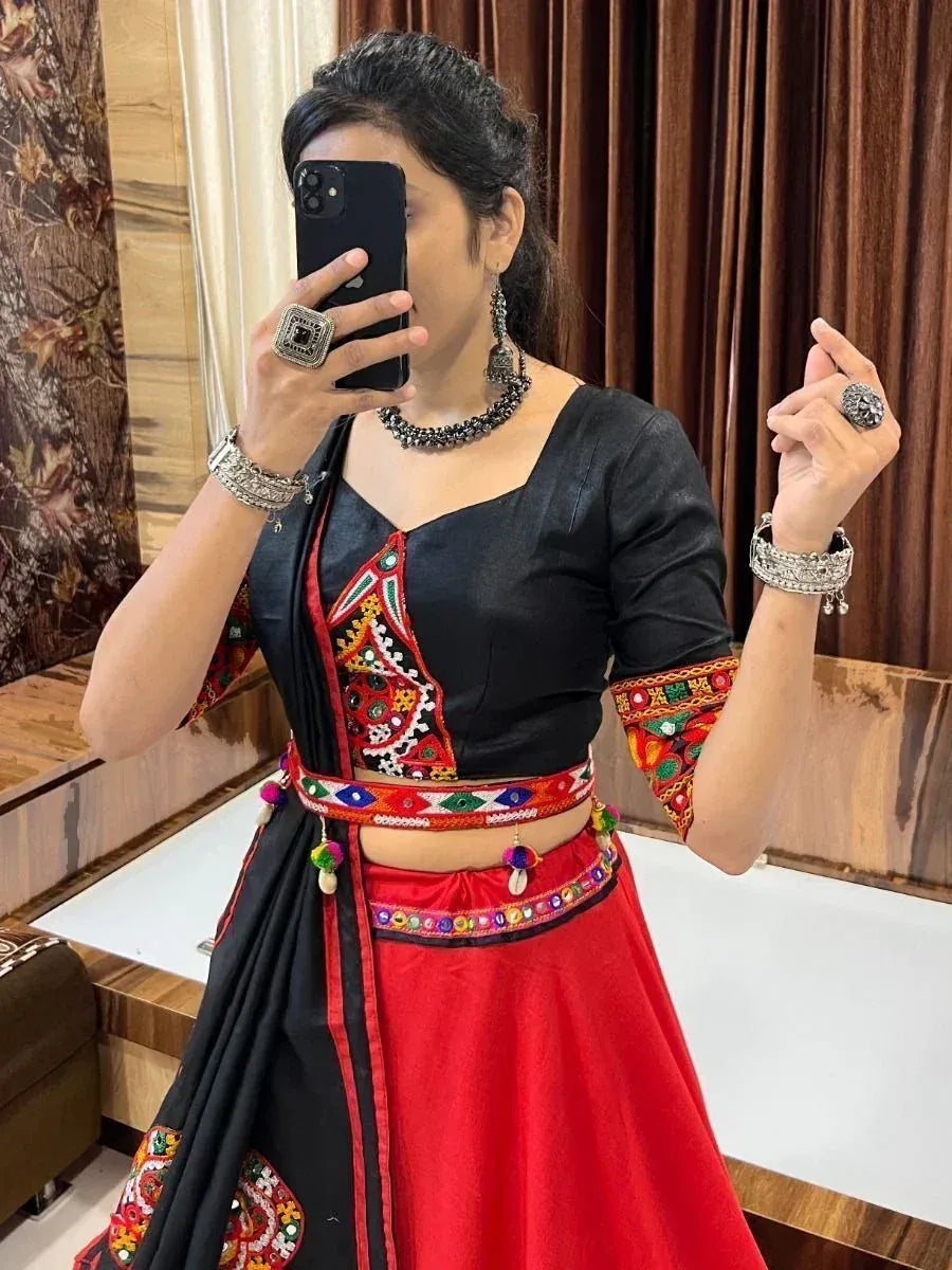 Black and red embroidered ethnic lehenga choli with mirror work, perfect for festive occasions