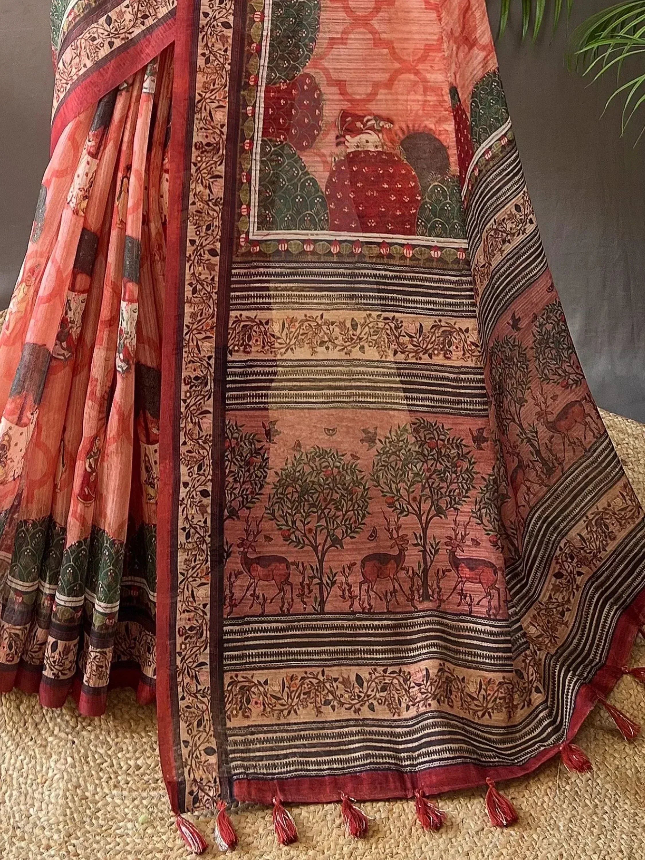 Indian ethnic saree with deer and tree print, red border, tassels, traditional handblock design