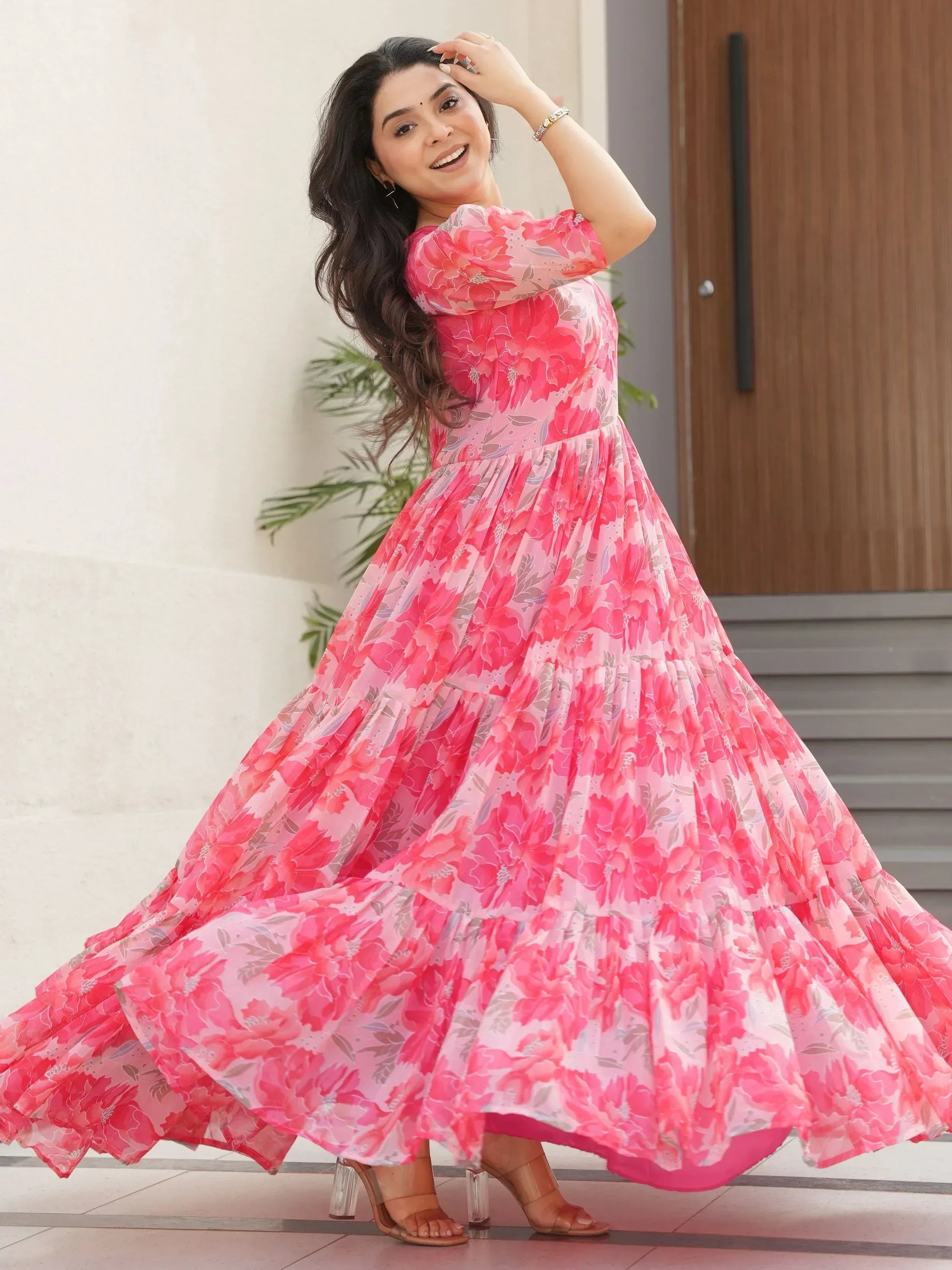 Pink floral ethnic gown with tiered skirt, perfect for Indian occasions and festive wear