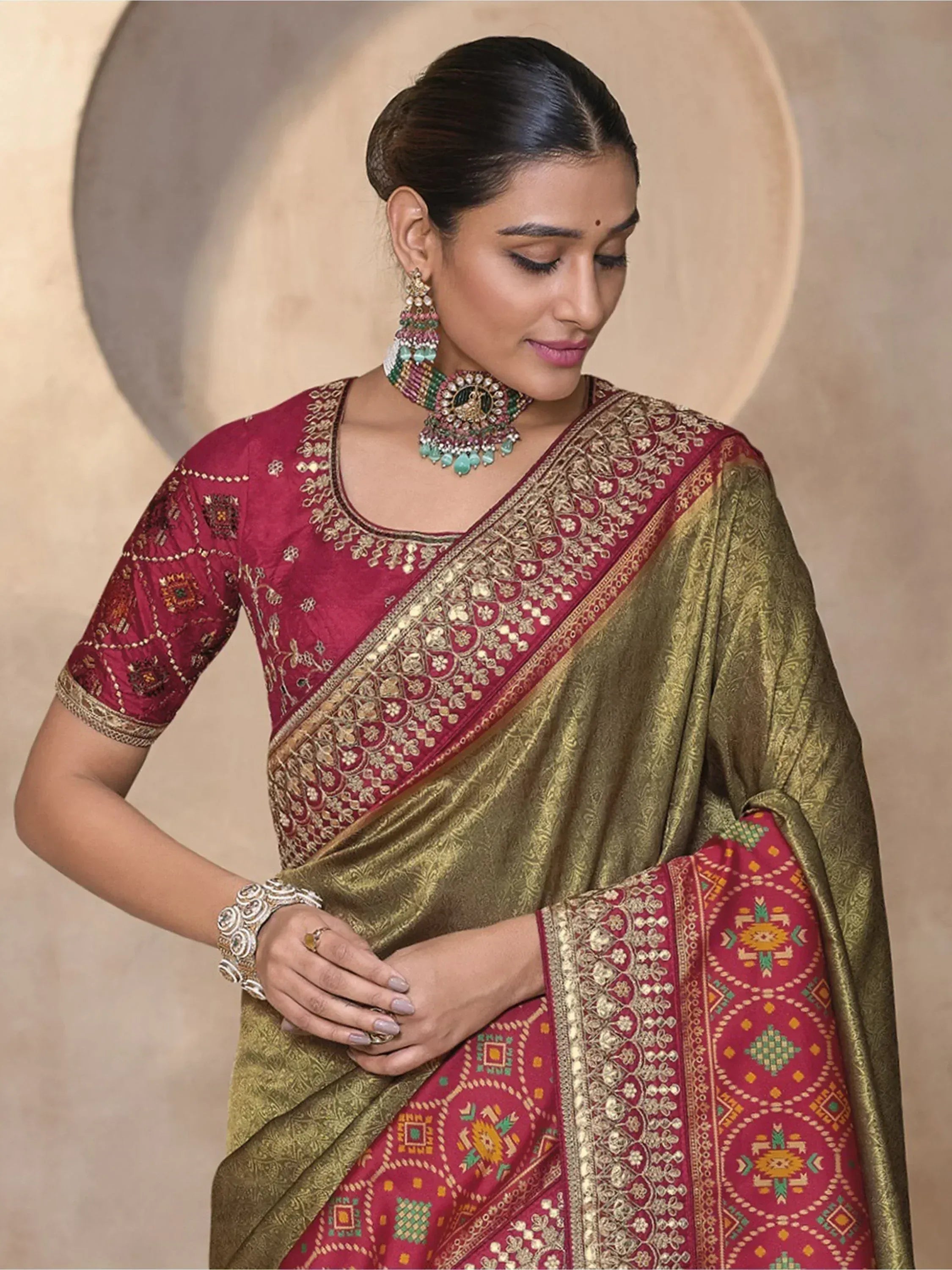 Elegant maroon and gold embroidered saree with matching blouse, traditional Indian ethnic wear