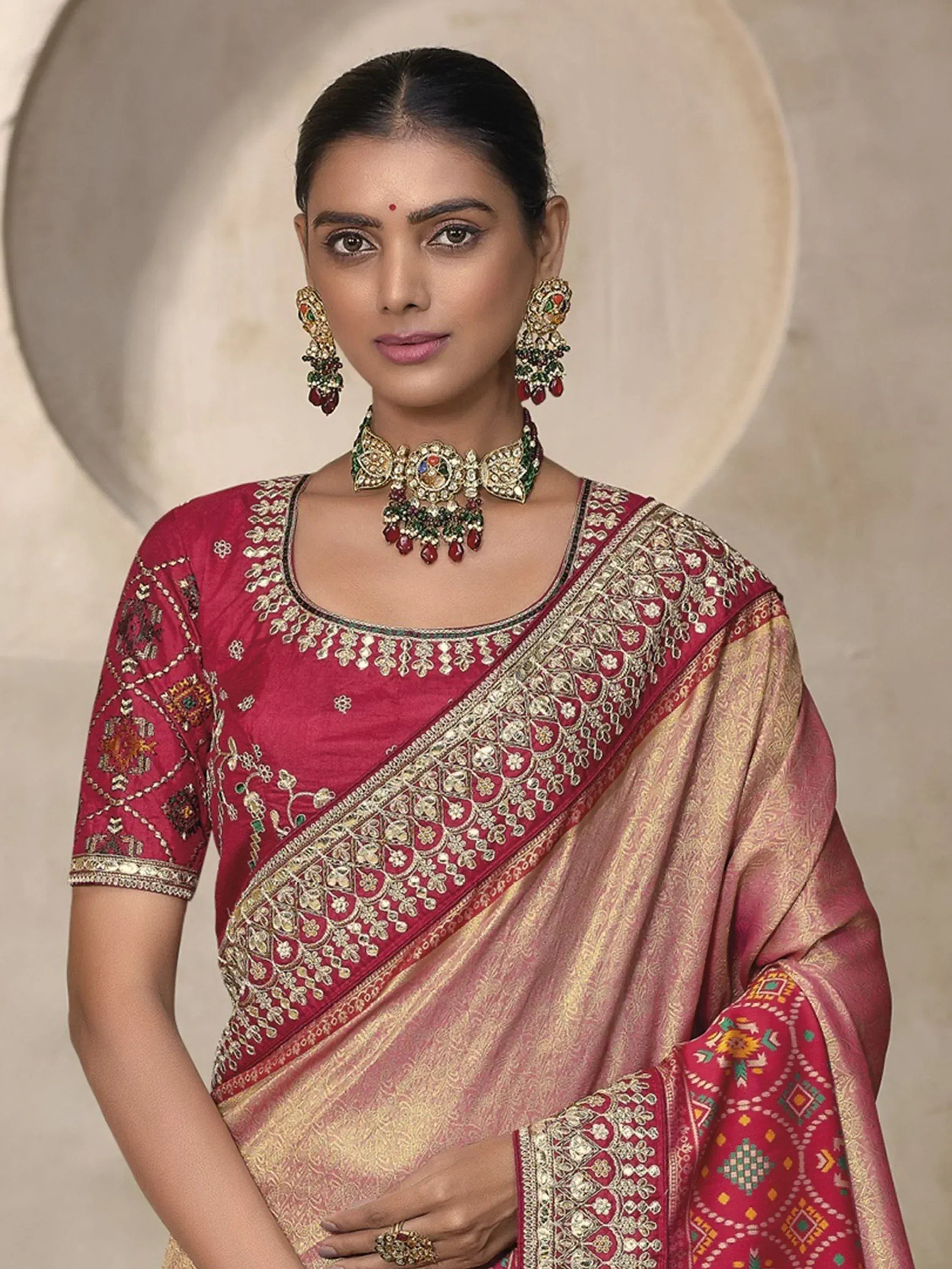 Elegant maroon and gold embroidered saree with matching blouse, perfect for Indian ethnic occasions