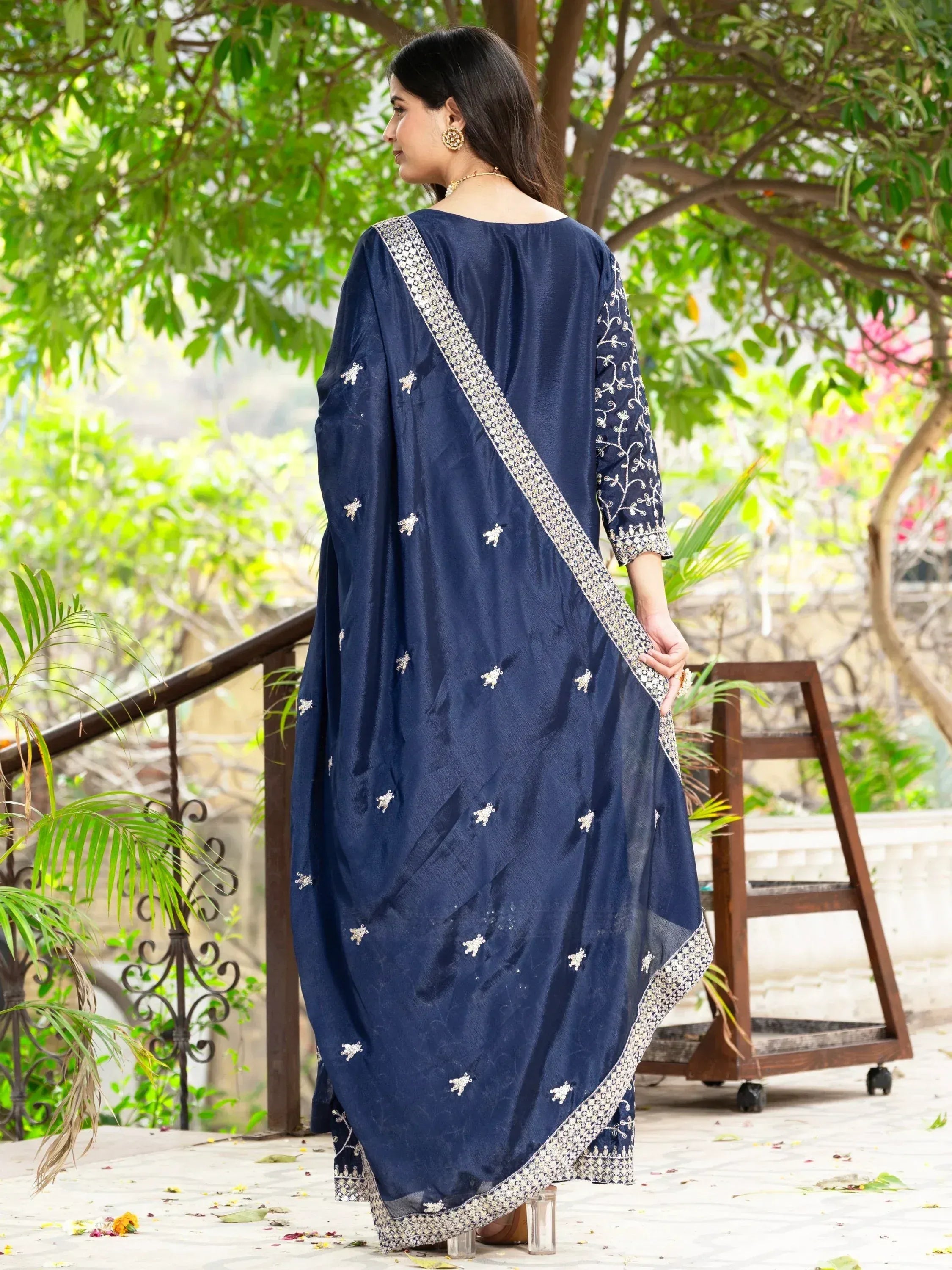 Navy blue embroidered salwar kameez with floral detailing, perfect for ethnic occasions