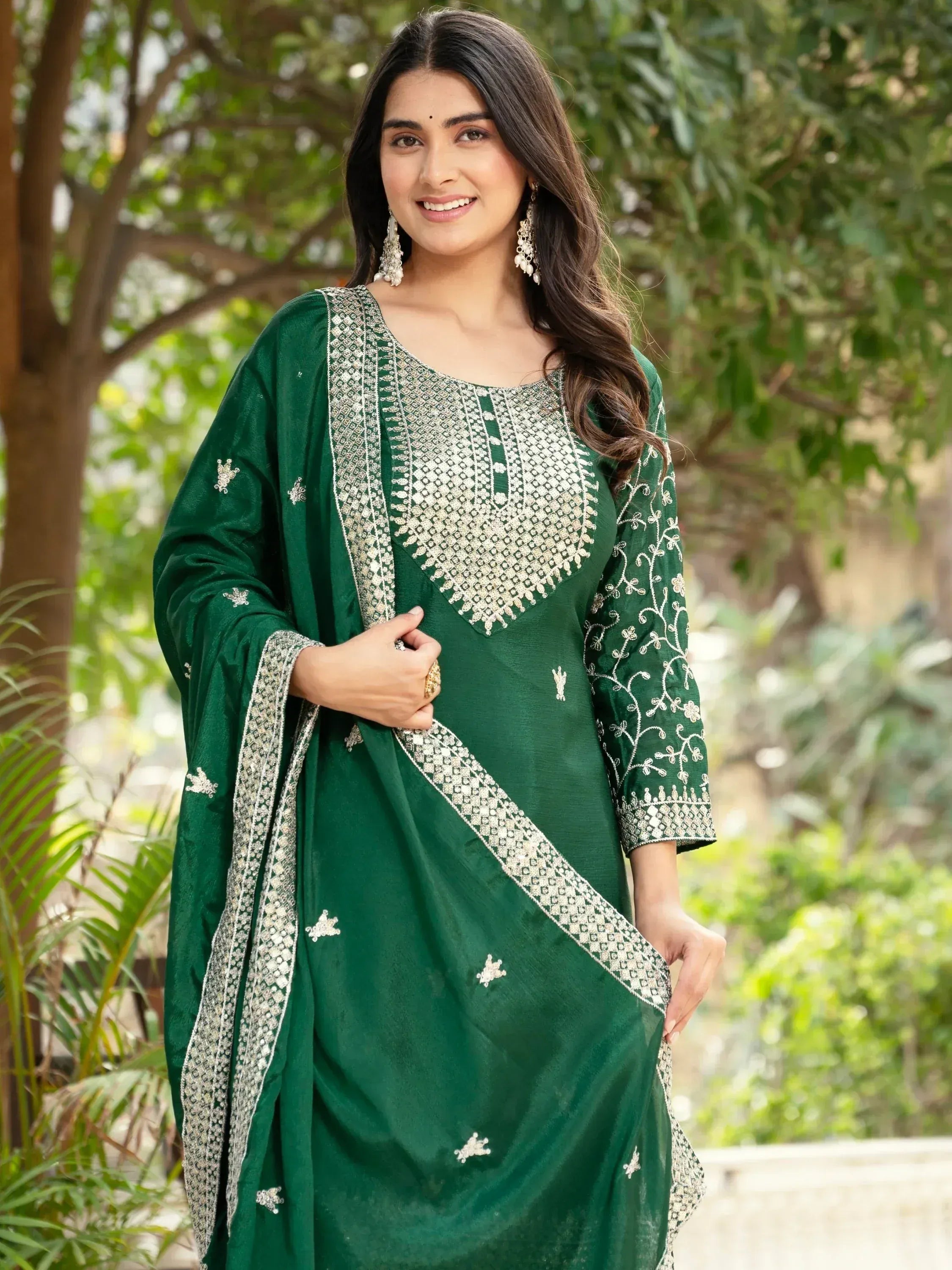 Emerald green embroidered salwar kameez with silver work, perfect for Indian ethnic wear occasions