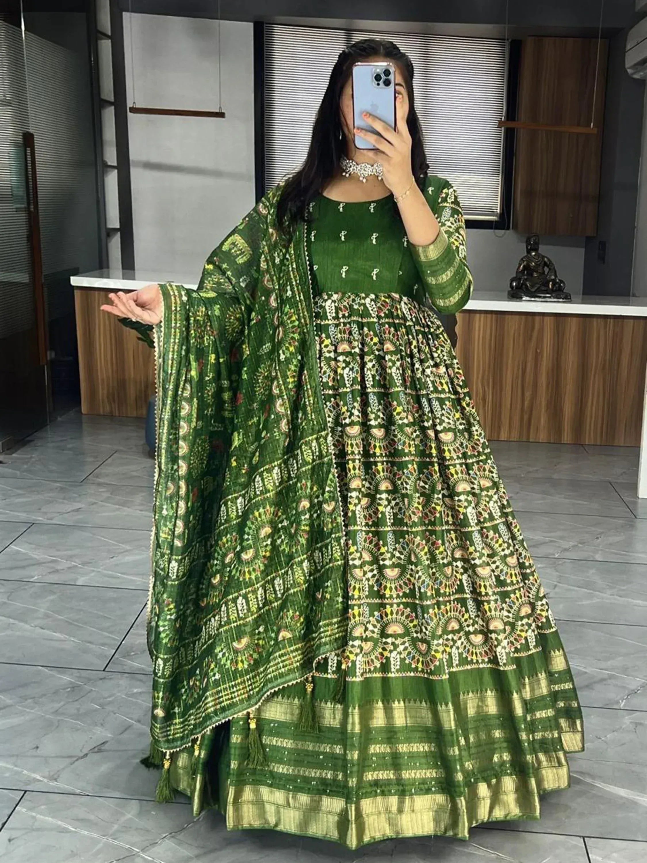 Green printed Indian ethnic anarkali suit with dupatta, perfect for festive occasions and weddings