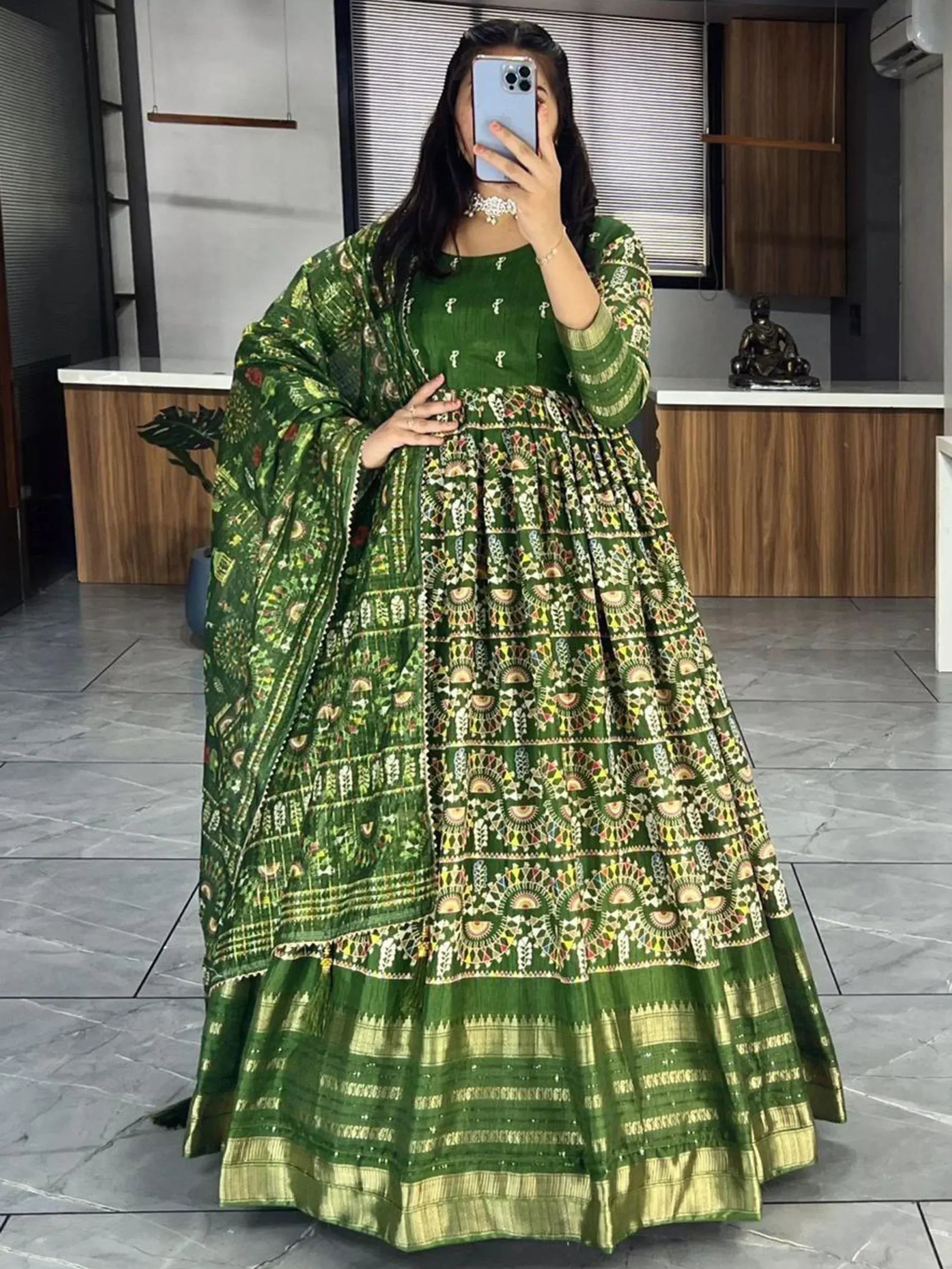 Green printed ethnic anarkali suit with dupatta, perfect for Indian occasions and festive wear.