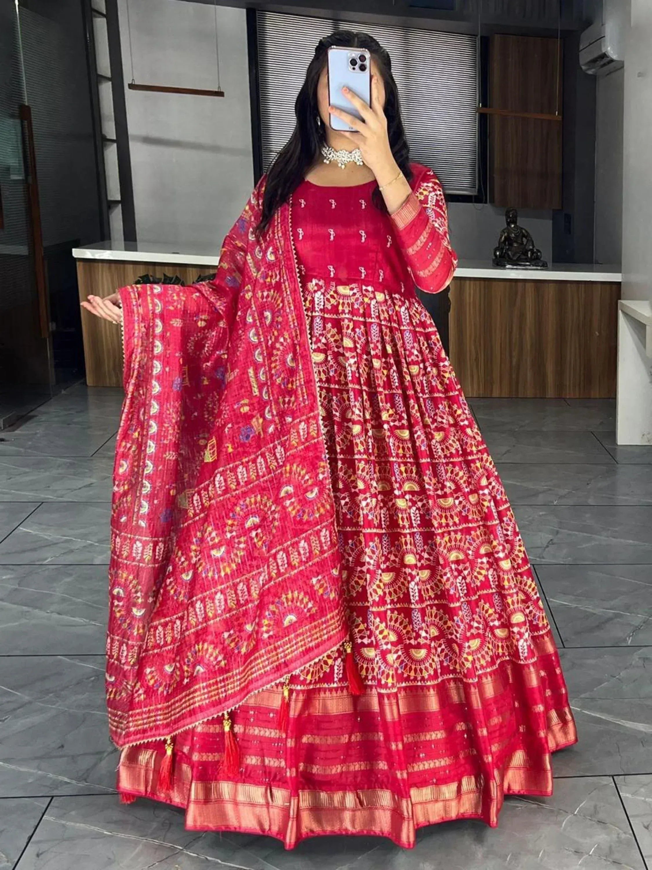 Red printed ethnic anarkali suit with matching dupatta, perfect for Indian festive occasions and weddings.