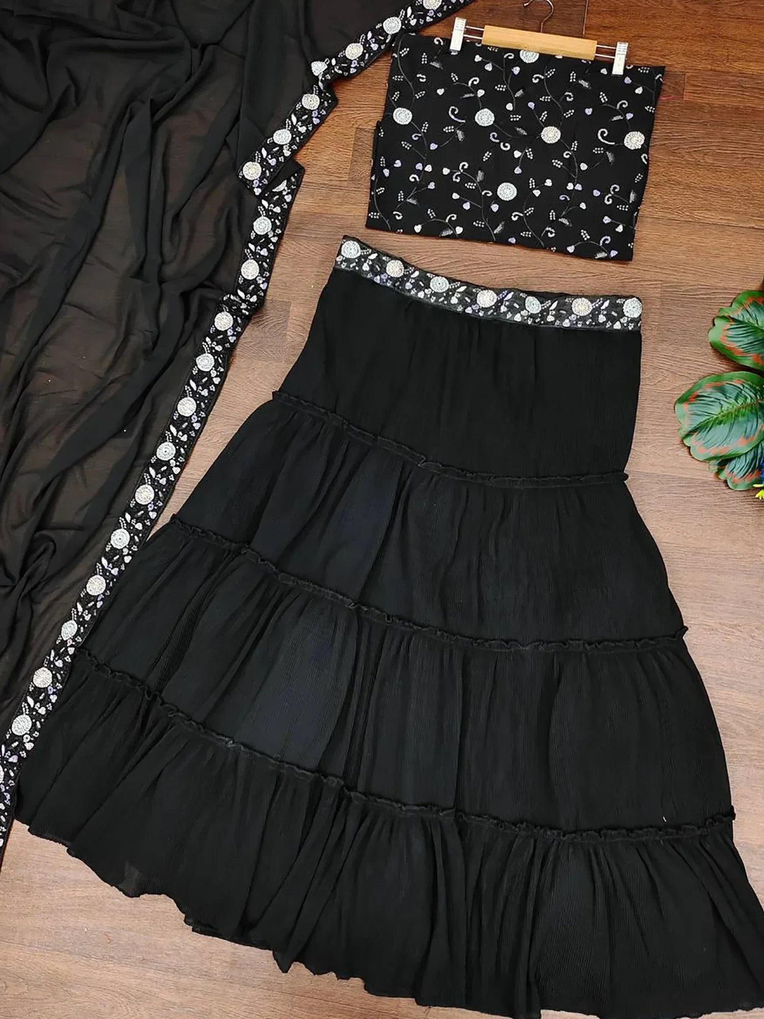 Fascinating Black Georgette Party Wear Lehenga With Embroidered Choli