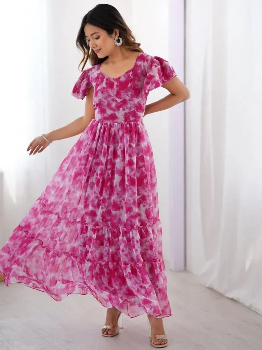 Pink tie-dye ethnic gown with ruffled tiers and puff sleeves for women