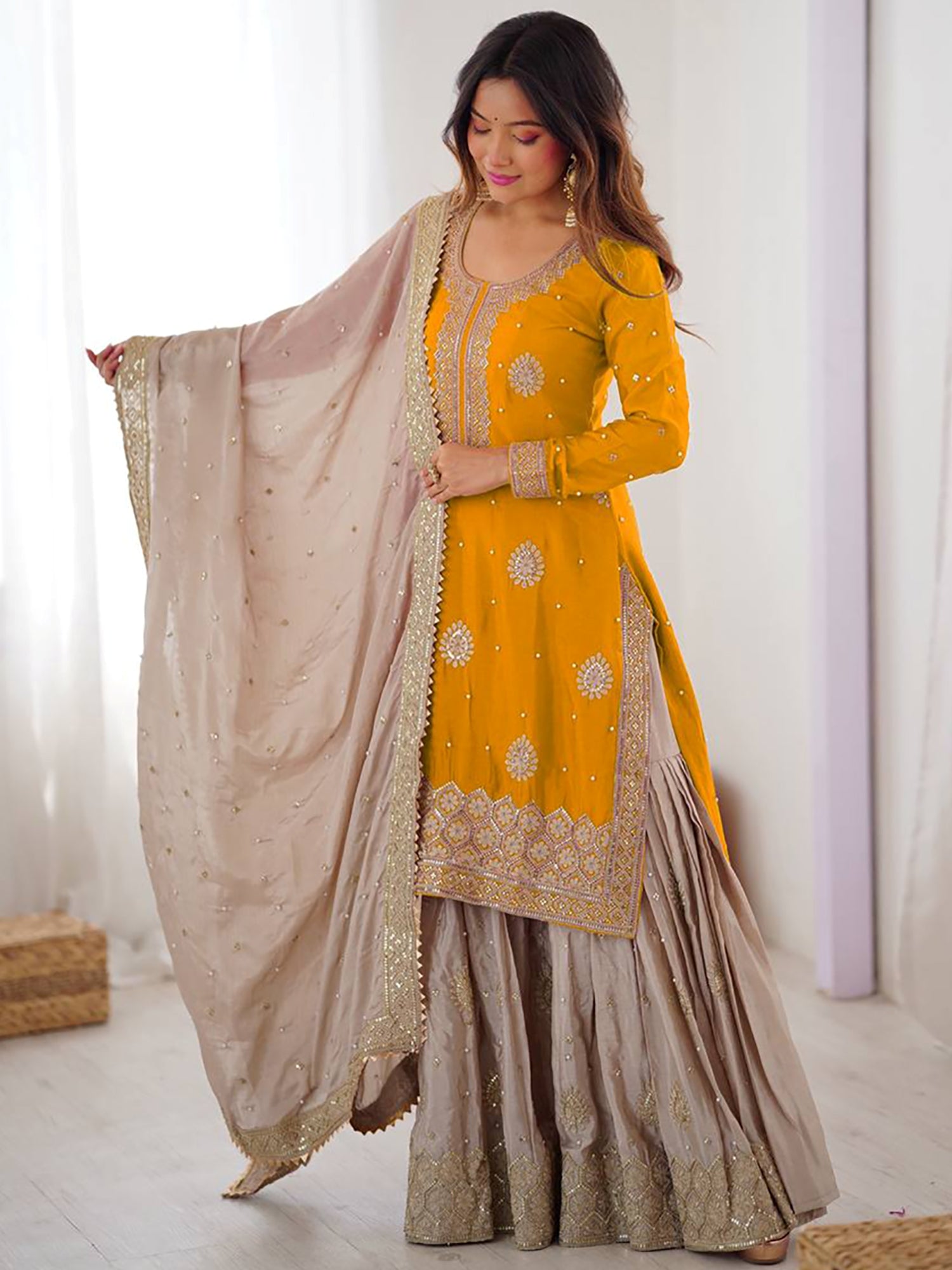 Impressive Yellow Embroidered Silk Festival Wear Sharara Suit