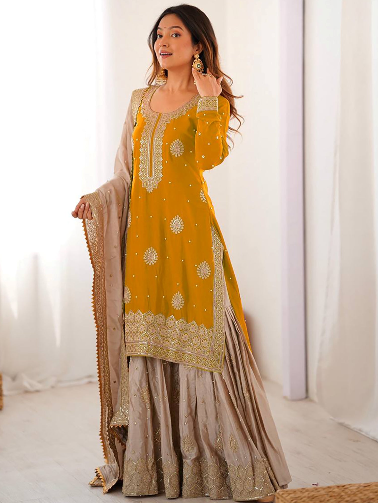 Impressive Yellow Embroidered Silk Festival Wear Sharara Suit