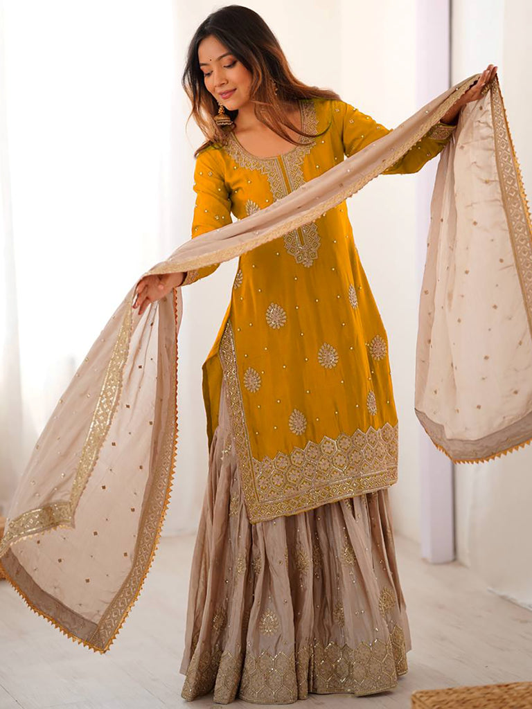 Impressive Yellow Embroidered Silk Festival Wear Sharara Suit