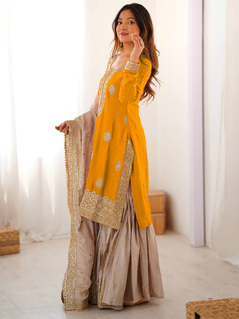 Impressive Yellow Embroidered Silk Festival Wear Sharara Suit