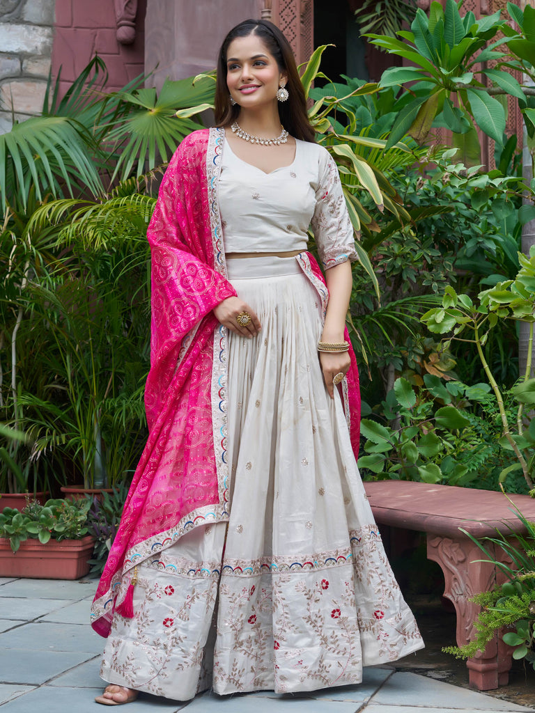 Amazing White Embroidered Silk Lehenga Choli With Pink Dupatta 
