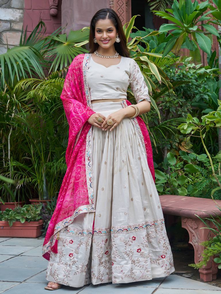 Amazing White Embroidered Silk Lehenga Choli With Pink Dupatta 