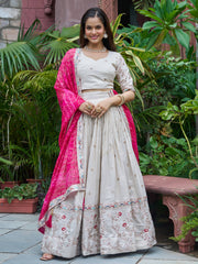 Amazing White Embroidered Silk Lehenga Choli With Pink Dupatta 