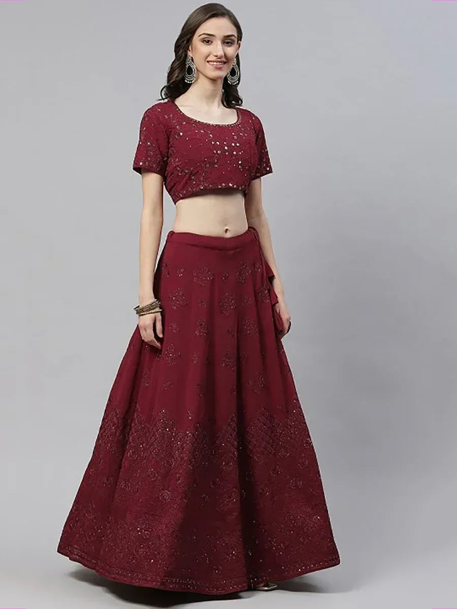 Maroon embroidered lehenga choli with short sleeves, perfect for Indian ethnic occasions