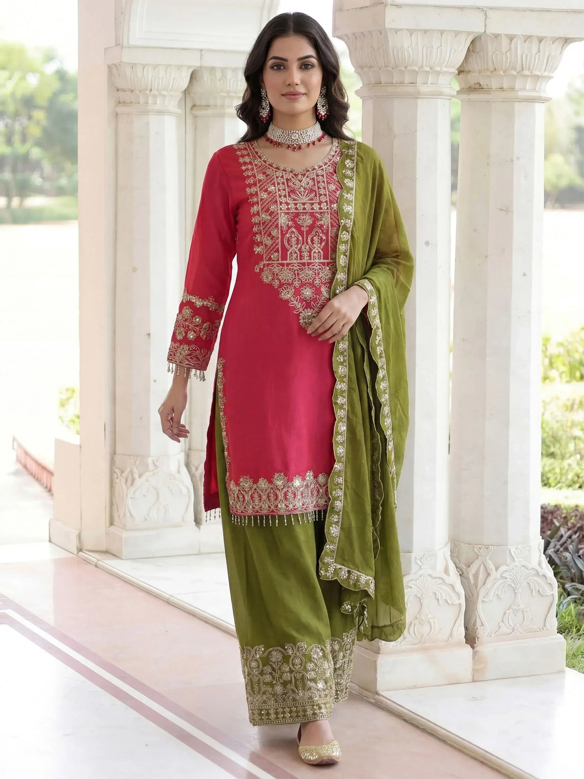 Red and green embroidered salwar kameez with gold detailing, perfect for Indian ethnic wear occasions