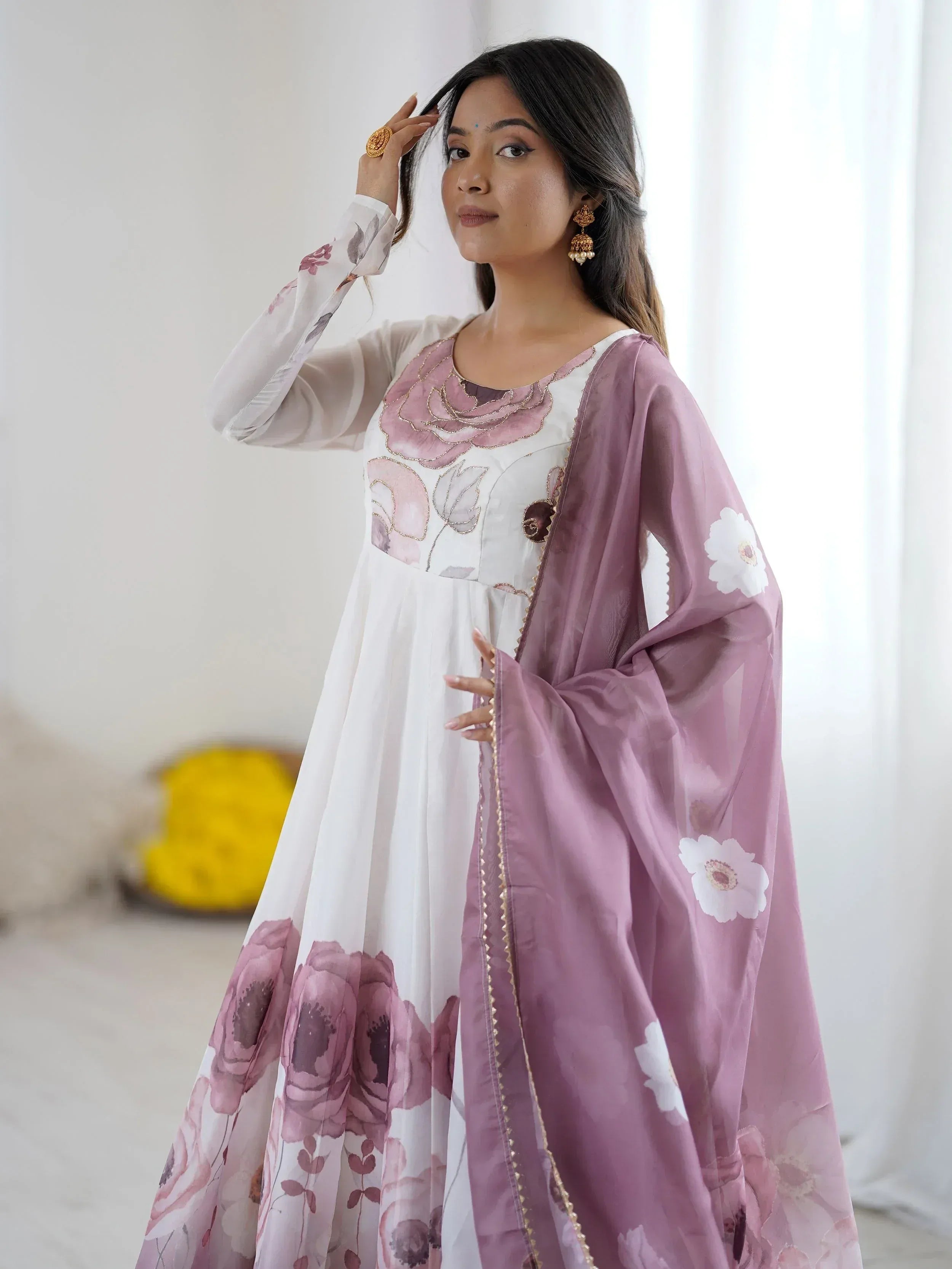White and mauve floral print anarkali with embroidered neckline and matching dupatta, styled with gold jewelry