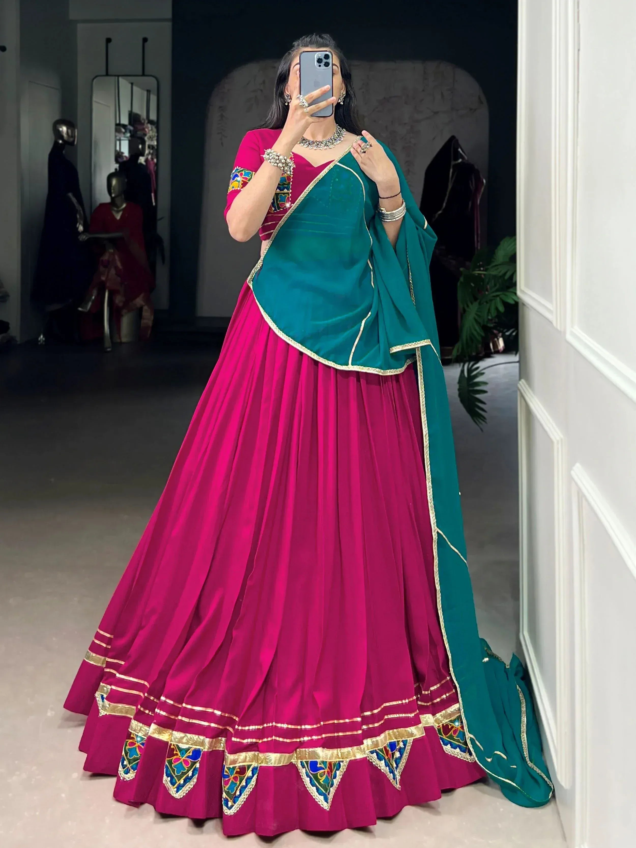 Pink and green designer lehenga choli with embroidered dupatta, perfect for Indian ethnic wear events