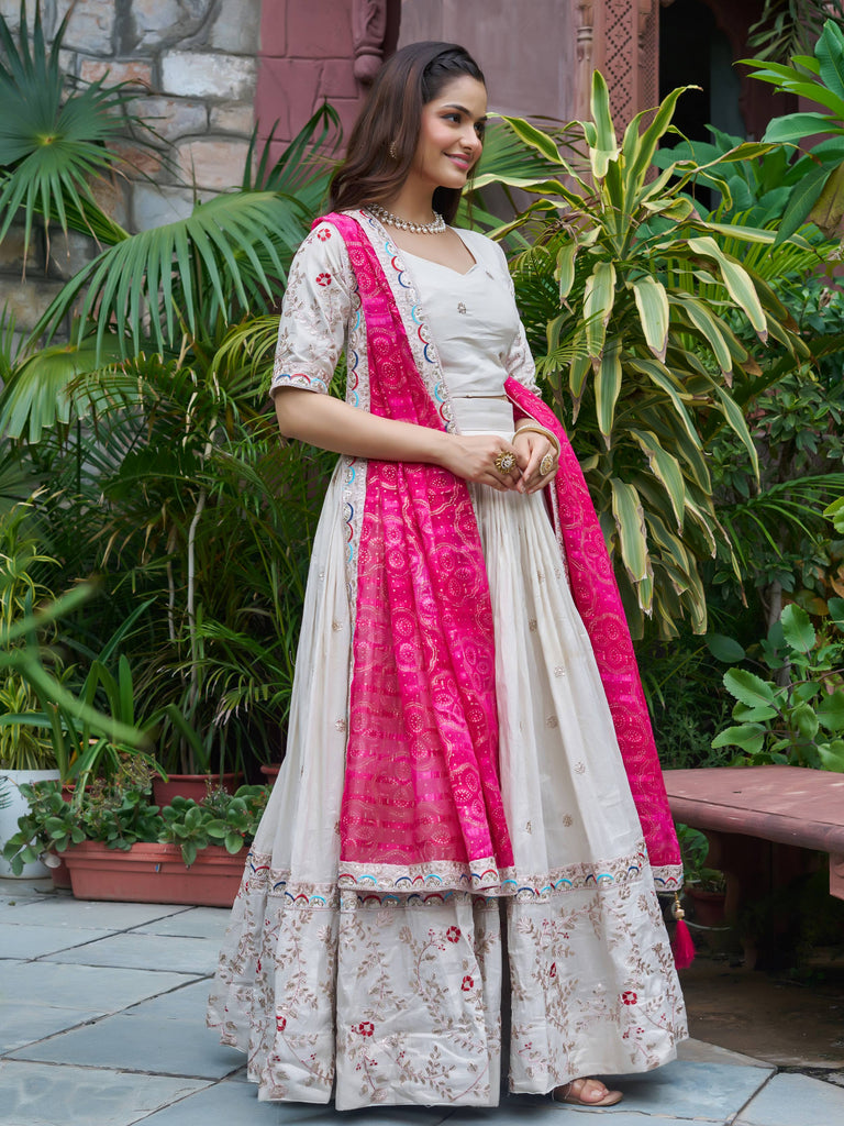 Amazing White Embroidered Silk Lehenga Choli With Pink Dupatta 