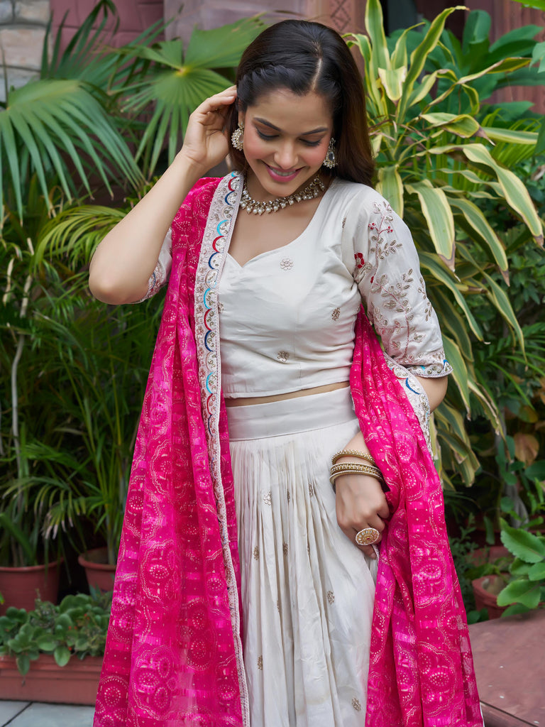 Amazing White Embroidered Silk Lehenga Choli With Pink Dupatta 