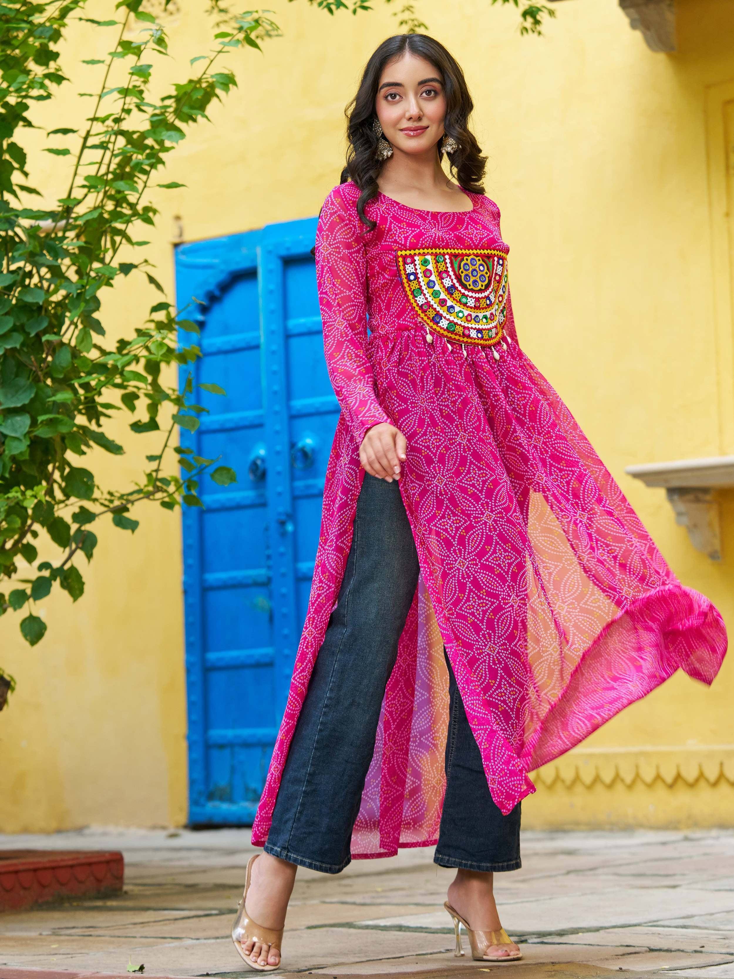 Pink ethnic kurti with mirror work, paired with jeans, for Indian wear