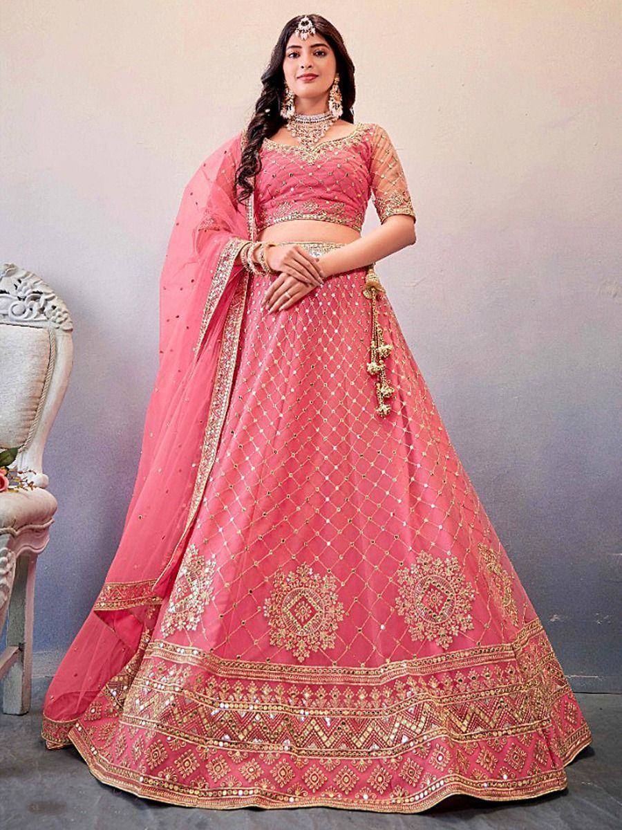 Pink designer lehenga choli with gold embroidery, perfect for weddings and festive occasions