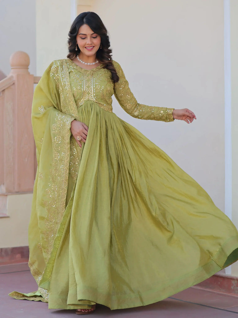 Tantalizing Pista Green Organza Mehendi Wear Gown With Dupatta