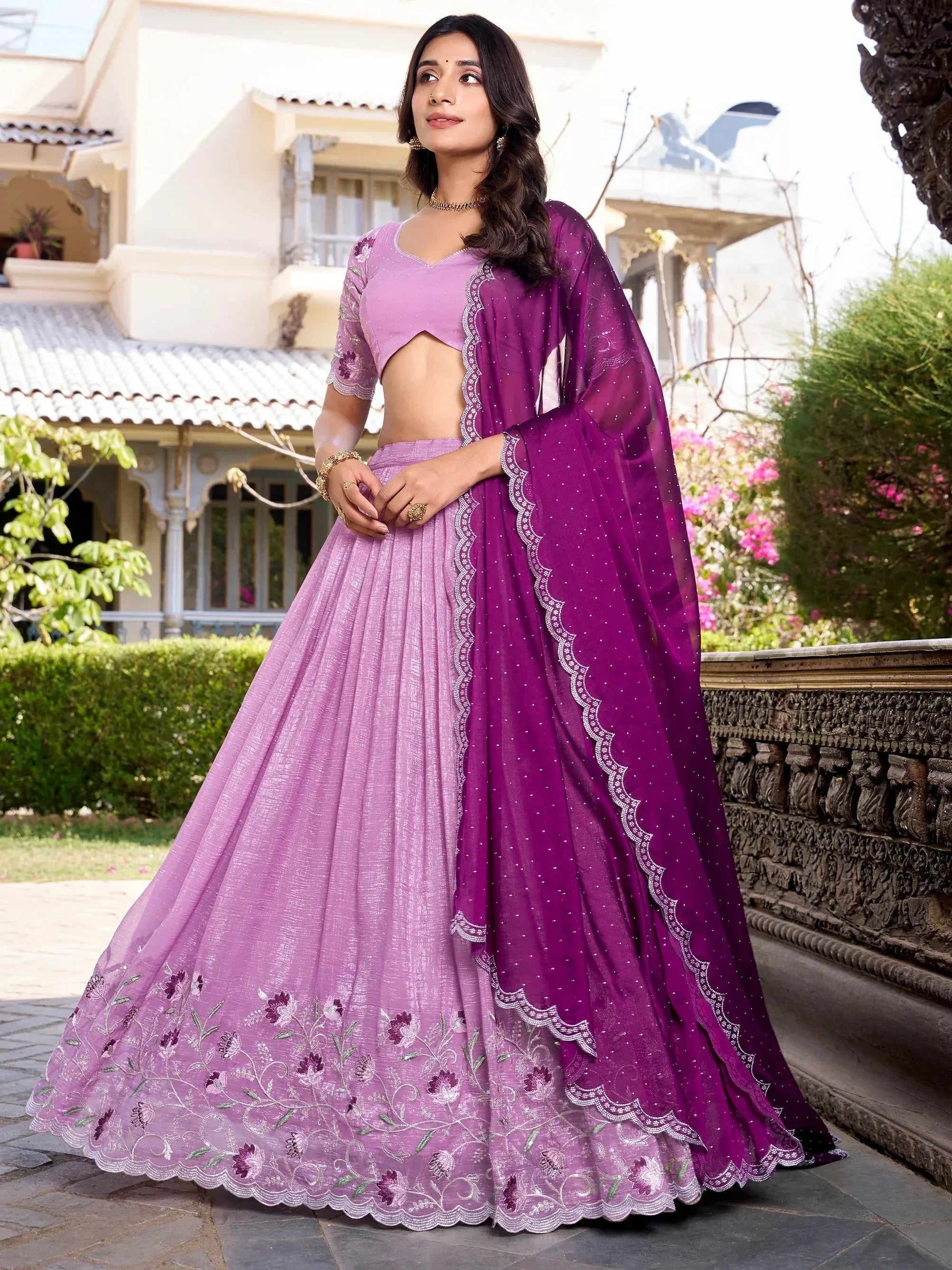 Purple and lavender embroidered lehenga choli with floral detailing, perfect for Indian ethnic occasions.