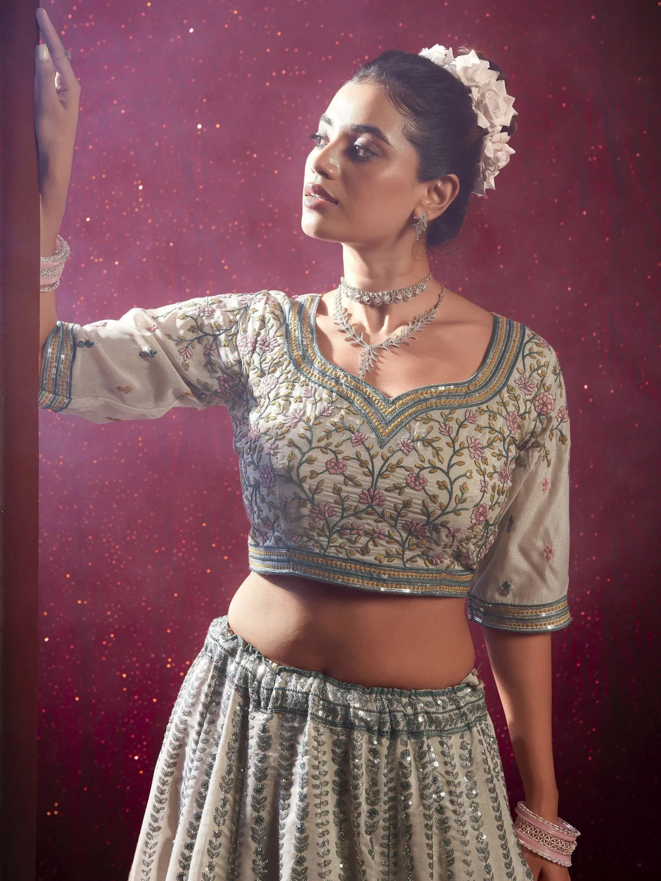 Elegant floral embroidered lehenga choli with sequin detailing, perfect for Indian ethnic occasions.
