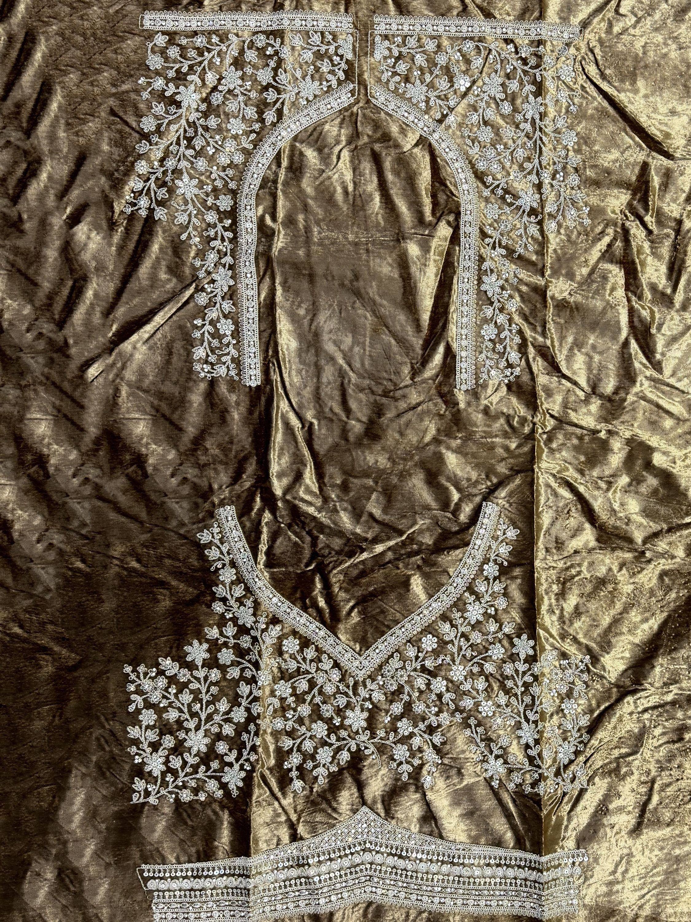 Gold velvet ethnic blouse with intricate white floral embroidery and sequin detailing for Indian wear