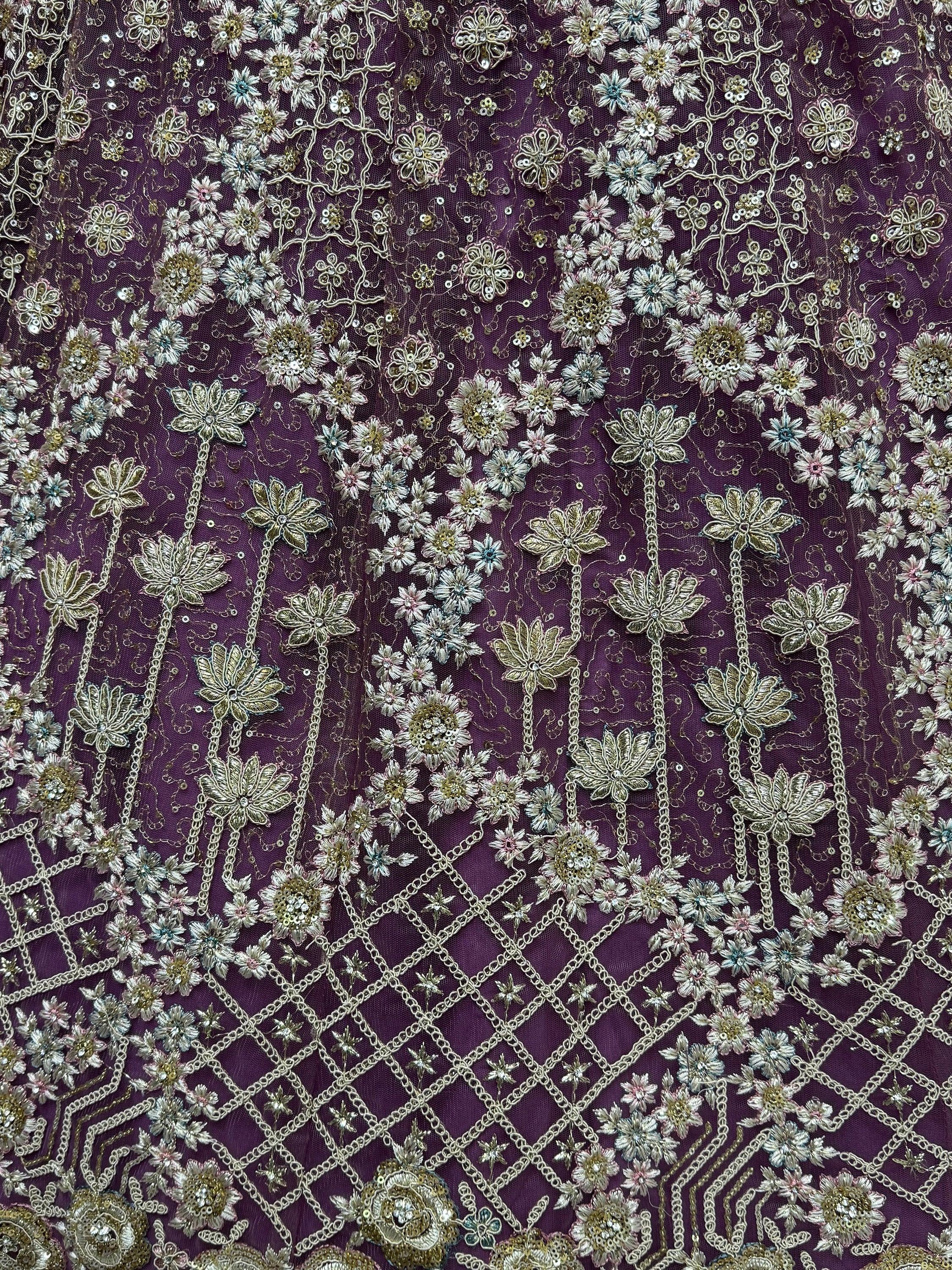 Purple ethnic fabric with floral embroidery, sequins, and chain detailing for designer lehenga or saree