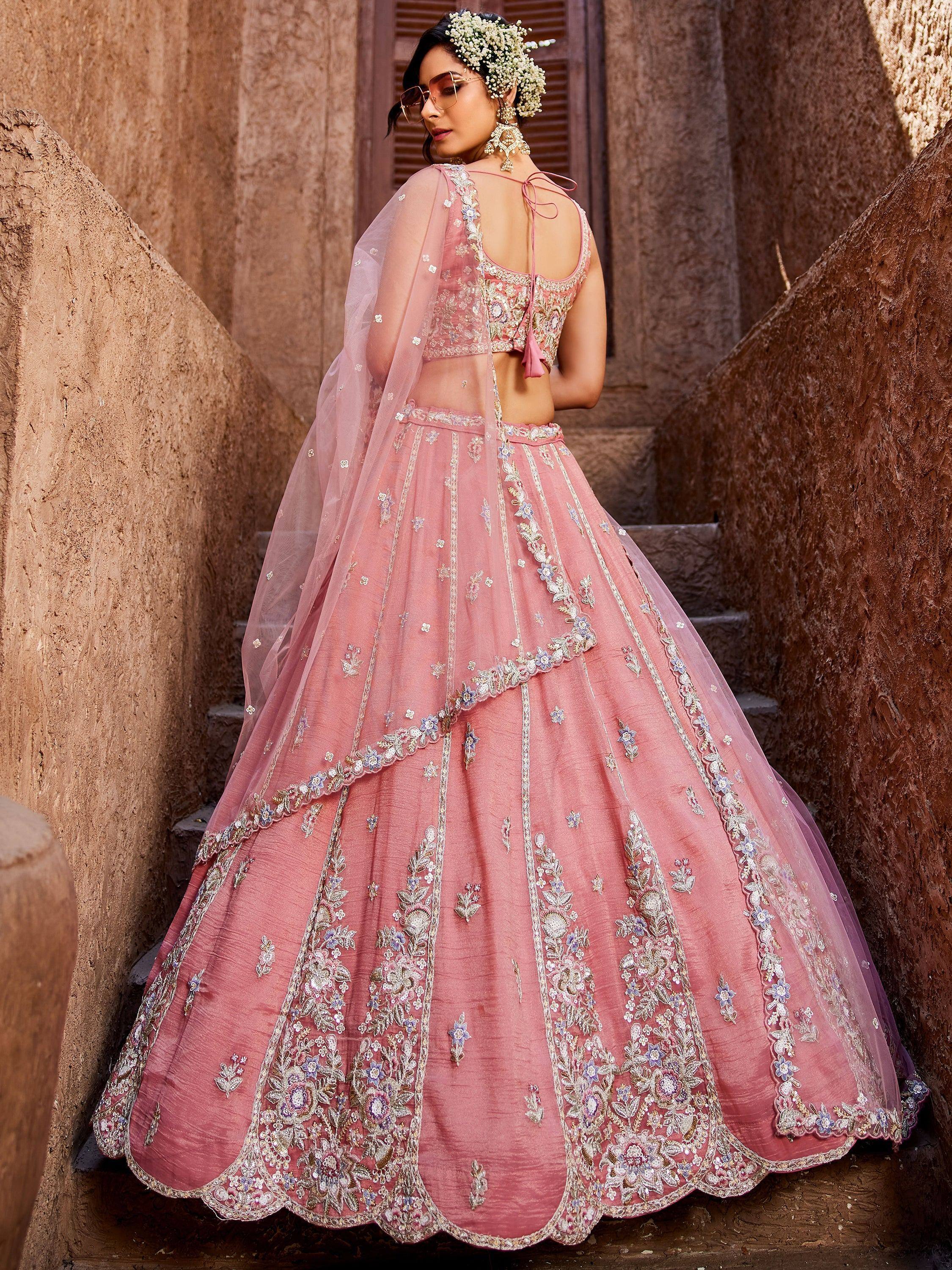 Pink embroidered lehenga choli with floral detailing, perfect for Indian weddings and festive occasions