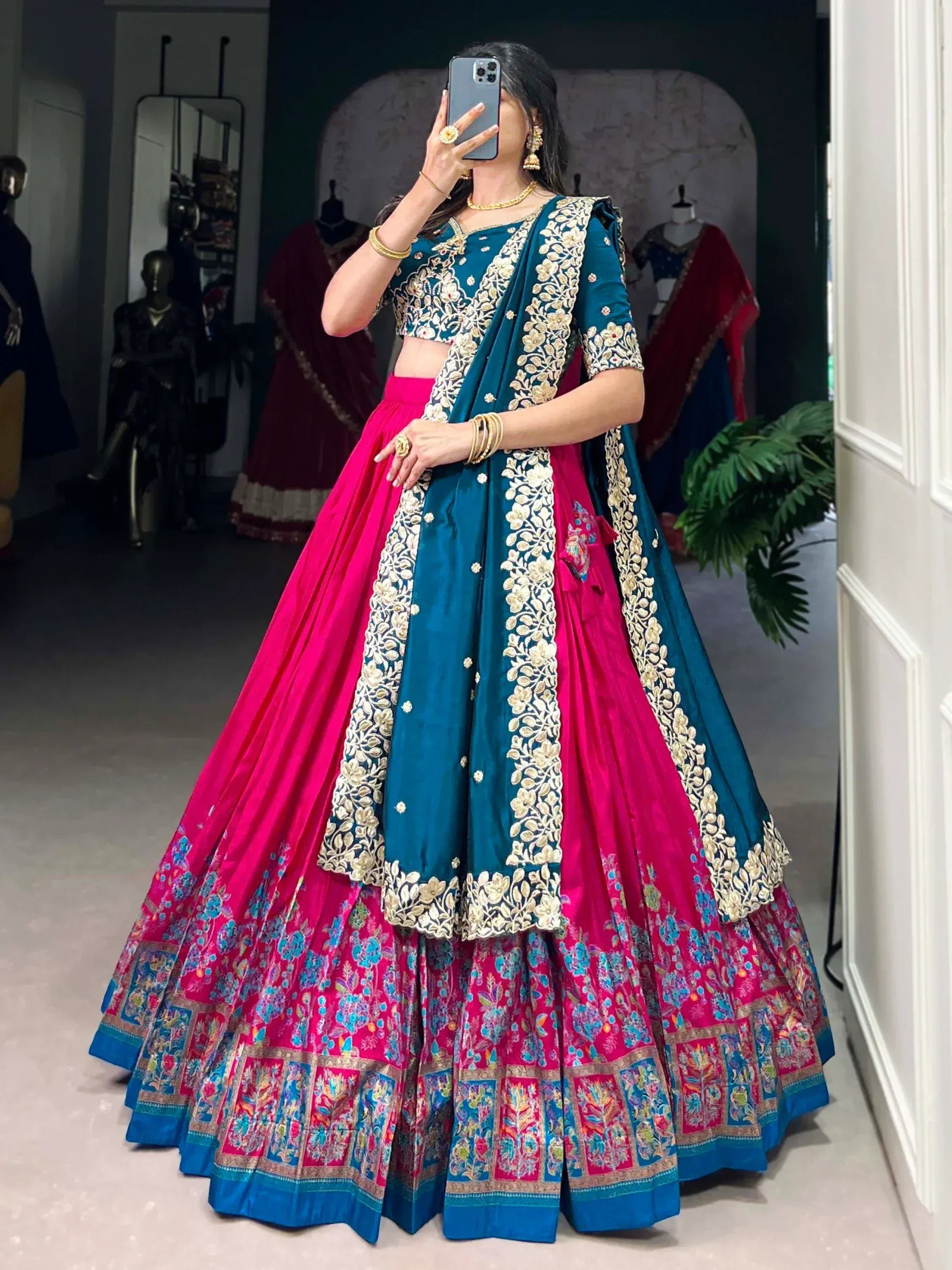 Teal and pink embroidered lehenga choli with floral dupatta, Indian ethnic wear