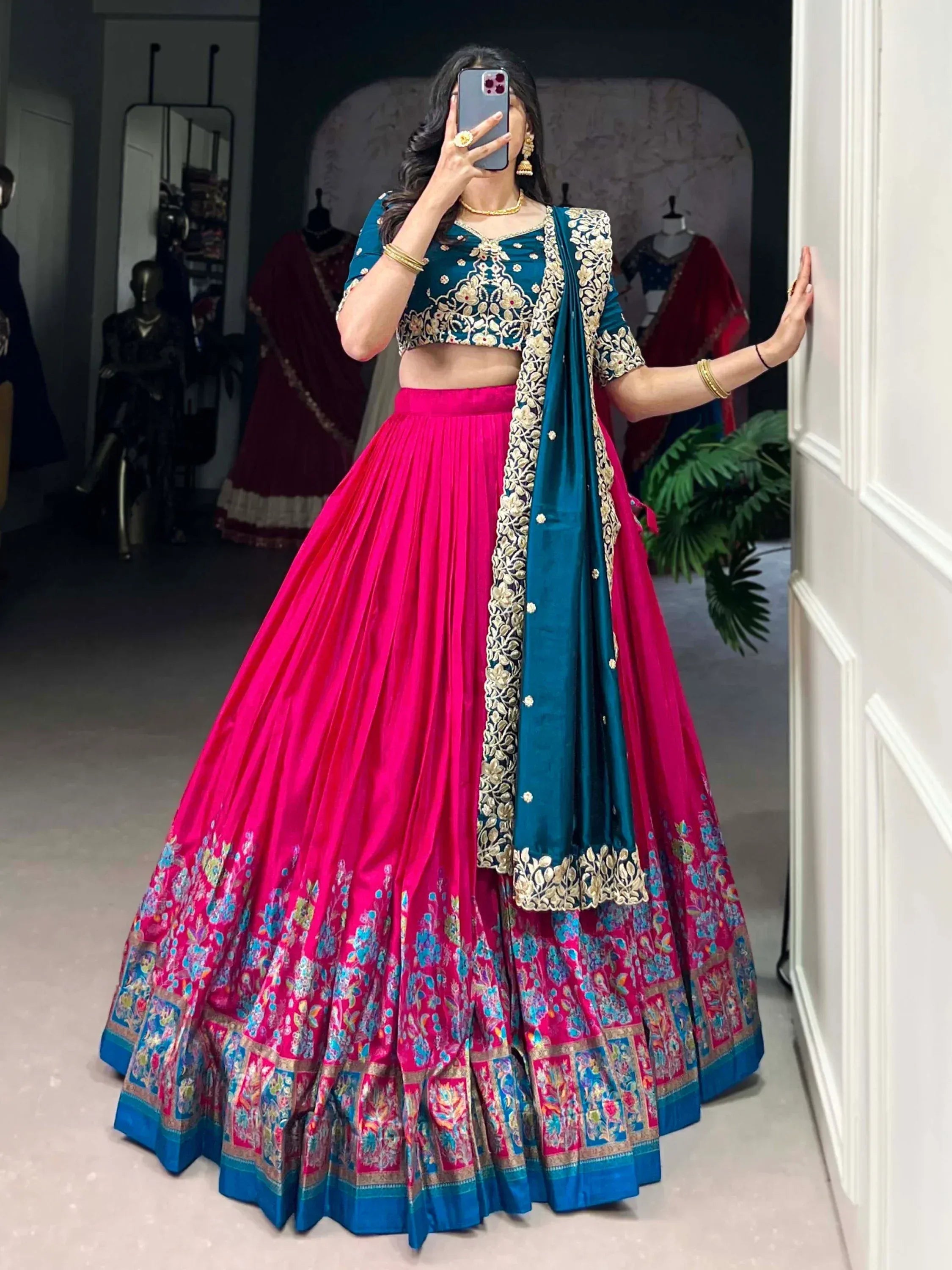 Teal and pink embroidered lehenga choli with floral dupatta, Indian ethnic wear for weddings and parties