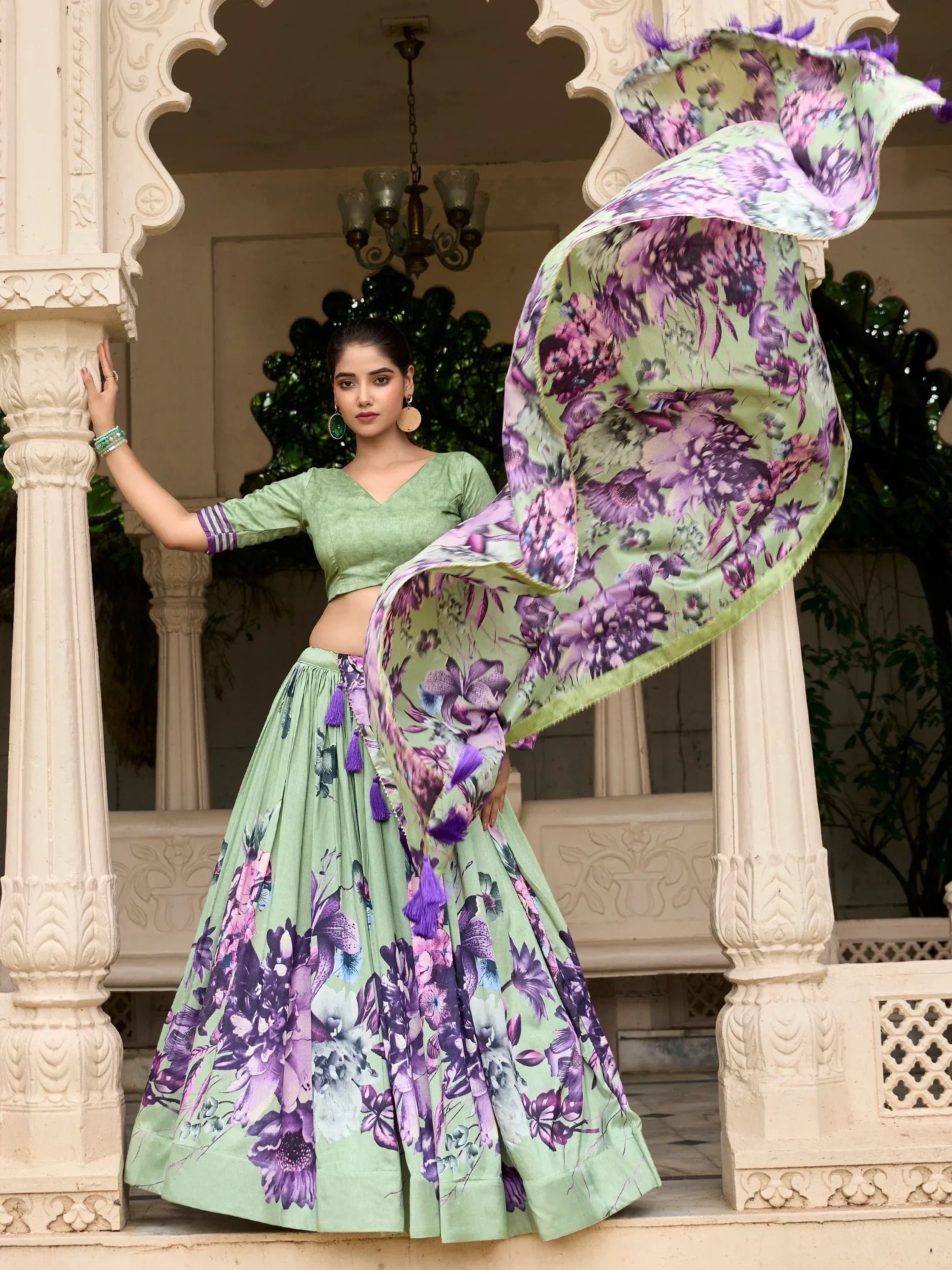 Green floral lehenga choli with purple accents, perfect for Indian ethnic wear events