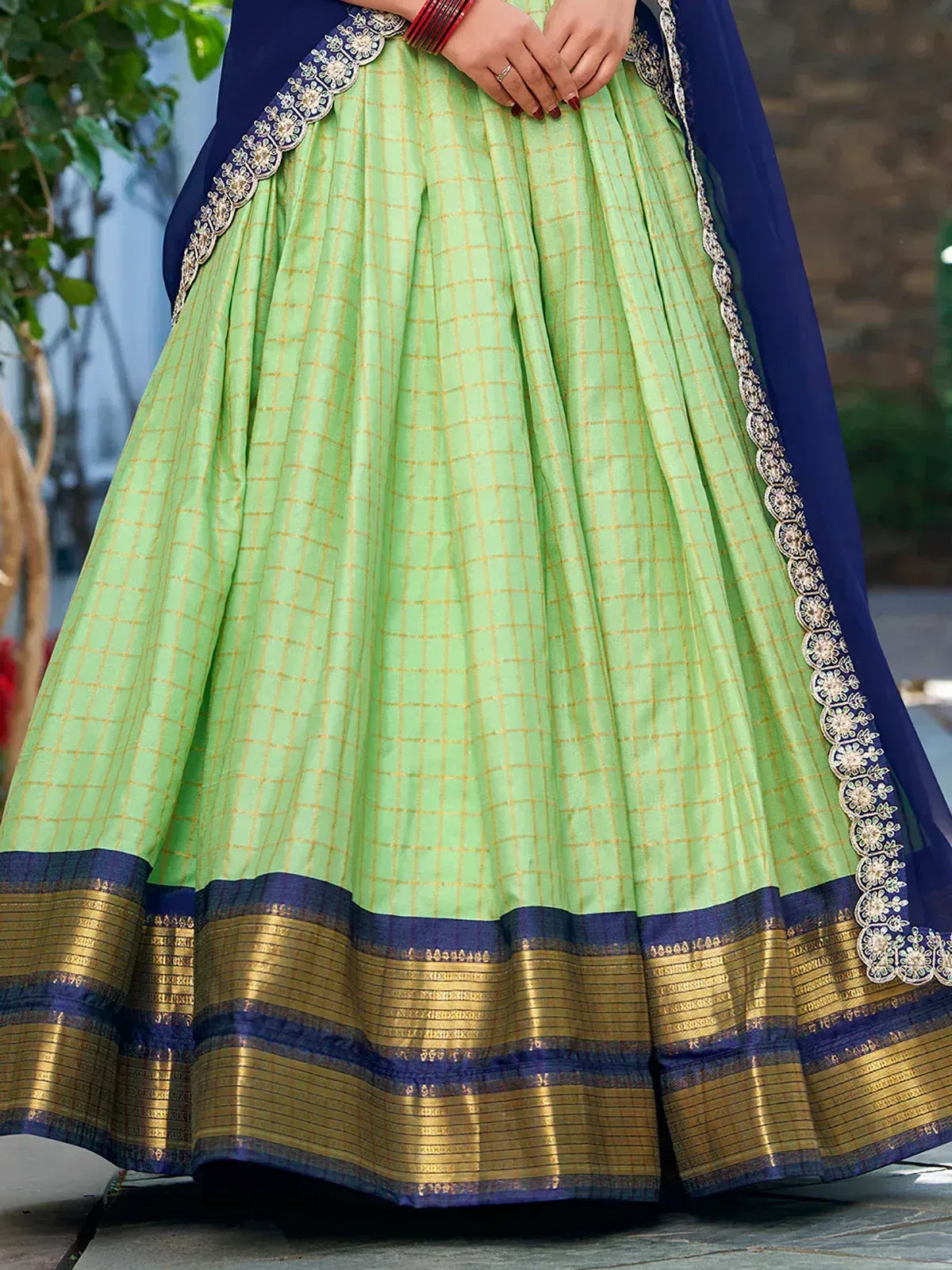 Green checkered lehenga with navy blue dupatta and gold border, ethnic Indian wear