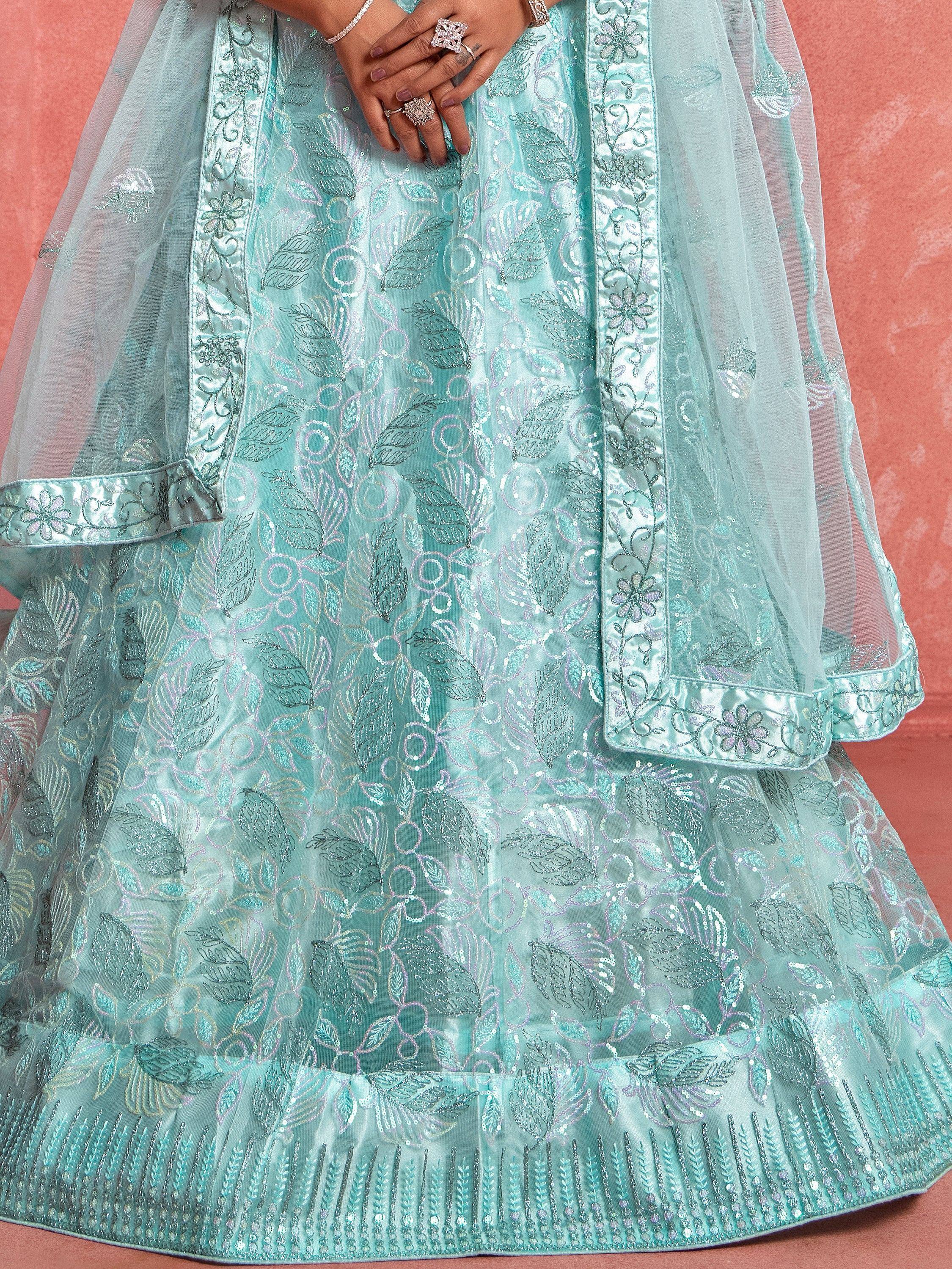 Mint green embroidered lehenga choli with floral sequin work and sheer dupatta, perfect for Indian ethnic wear.